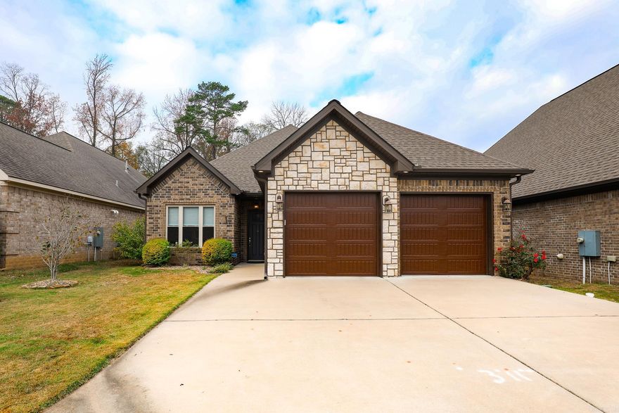 WOW... PICTURE PERFECT HOME...Amenities include: Approximately 2589 Square Feet, 4 Bedrooms, 2 1/2 Bathrooms, Office/4th Bedroom, Kitchen/Dining Combo, Living/Dining Combo, Split Bedroom Floorplan, Open Floorplan, Gas Log Fireplace, Large Pantry, Spacious Kitchen ( Built in spice racks, ample storage, added storage in island under breakfast bar ) , Granite Countertops, Super Nice Stainless Appliances, Hardwood and Tile Flooring throughout home, Tall Ceilings and 8' Doors throughout home, Large Primary Bedroom, Spacious Primary Bathroom with Custom Tile Shower ( shower has Rain Head, 2 Shower Heads, Jets, etc.. ), Laundry Room, Spare Bedrooms with large Jack and Jill Bathroom, Covered Private Patio overlooking Landscaped Privacy fenced back yard, Storm Shelter in Garage, Sprinkler System, 2 Car Garage, And Much More... A Must See ... This is a very Custom Home... Bryant Schools.. Close and Convenient to all area Churches, Schools, Shopping, Dining, etc.. with all the Amenities of Hurricane Lake Estates.. Agents: See Agent Remarks