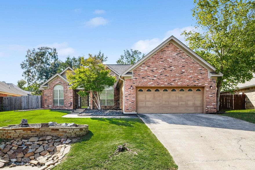 This all-brick home in the Benton School District offers three bedrooms and two bathrooms with a well-planned split layout. The oversized primary suite includes a tray ceiling with a sitting area, plus an ensuite bath with a double vanity, separate soaker tub, and walk-in shower. The two additional bedrooms each feature good-sized closets for plenty of storage. Vaulted ceilings create an open feel in the living area, while the kitchen provides a breakfast bar, room for a table, and access to the formal dining room.  Step outside to enjoy a private backyard with a patio and new decks, offering the perfect setting for outdoor relaxation or entertaining. Recent updates add peace of mind with a new roof in 2019, HVAC replaced in 2017, and a new water heater in 2025. Combining durable brick construction, spacious interior features, and inviting outdoor spaces, this home is a comfortable and convenient option in a great Benton location.