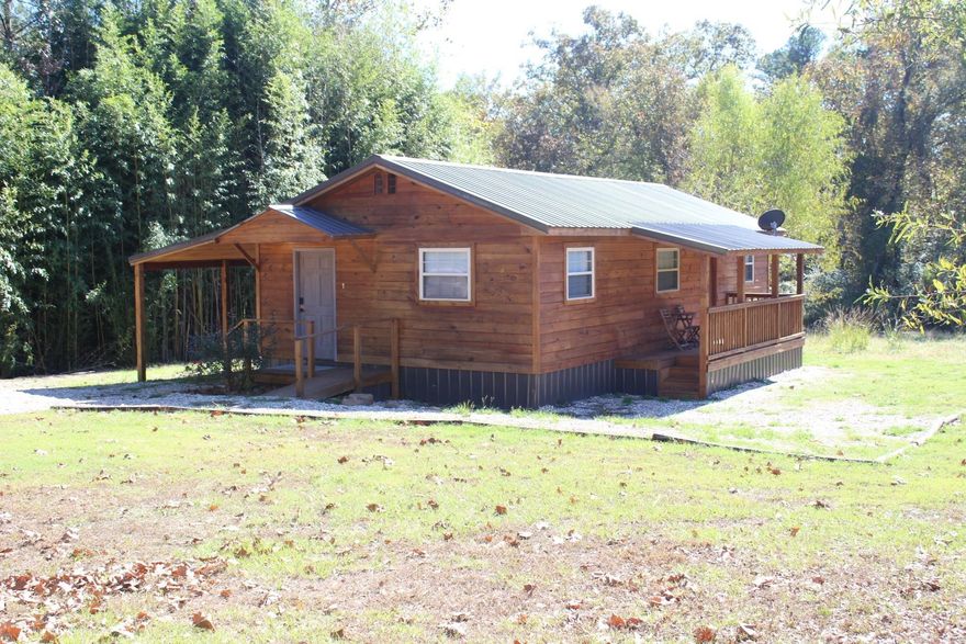 VRBO PROPERTY AVAILABLE (DAISY CREEK) 3 Fully Furnished Cabins (LOG) situated on approx. 7.90 acres (Room to build approx. 6 more cabins).  200 yards to Daisy State Park, One mile from boat ramps.  Bear Creek 31 mile ATV Trail at property.  Property has 3 RV hook ups (Water & Elec.) with one on sewer.  Cabins have central A/C & Heat.  One cabin has 2 bedrooms, full kitchen, family area, full bath and laundry area, the other two cabins are 1 bedroom, full kitchen, family area and full bath.  Covered carports, covered patio.  Cabins have metal roofing.