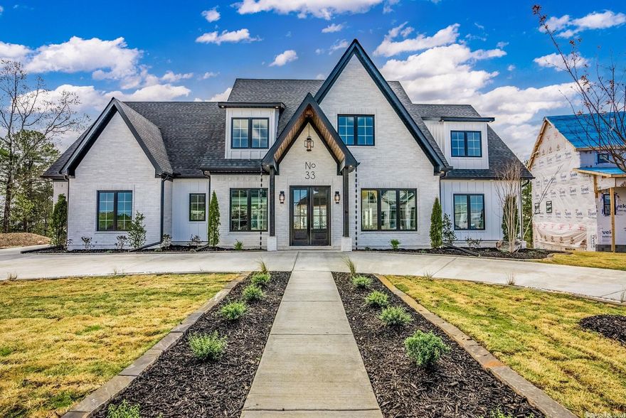 Walk up to your grand entrance with flawless landscape, and take awe of the BEAUTIFUL views. This homes craftsmanship is BAR NONE! The extraordinary build with 5 beds, 3 and 1/2 baths, and boasts of 4620 sq ft. The attention of detail makes the modern finishes feel homey. Enjoy an open floorplan and an oversized deck. The master bedroom& bath are the perfect, step out of a magazine touch! Your children or grandchildren will get to enjoy a flat lot as it was built up just for that. Welcome home to perfection