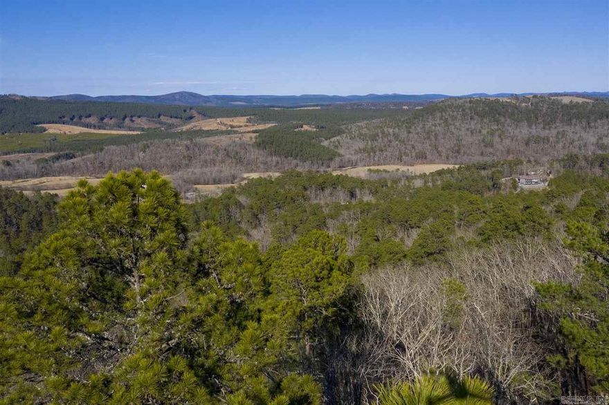 Breathtaking mountain views! Build your dream home on this beautiful home site nestled in the Quachita Mountains. Located in the nation's largest gated community featuring 11 lakes, 9 championship golf courses, mile after mile of hiking trails, tennis complex, and state-of-the-art fitness center. Golfing, fishing, hiking, boating, or just sitting on your deck surrounded nature....a virtual paradise awaits you!