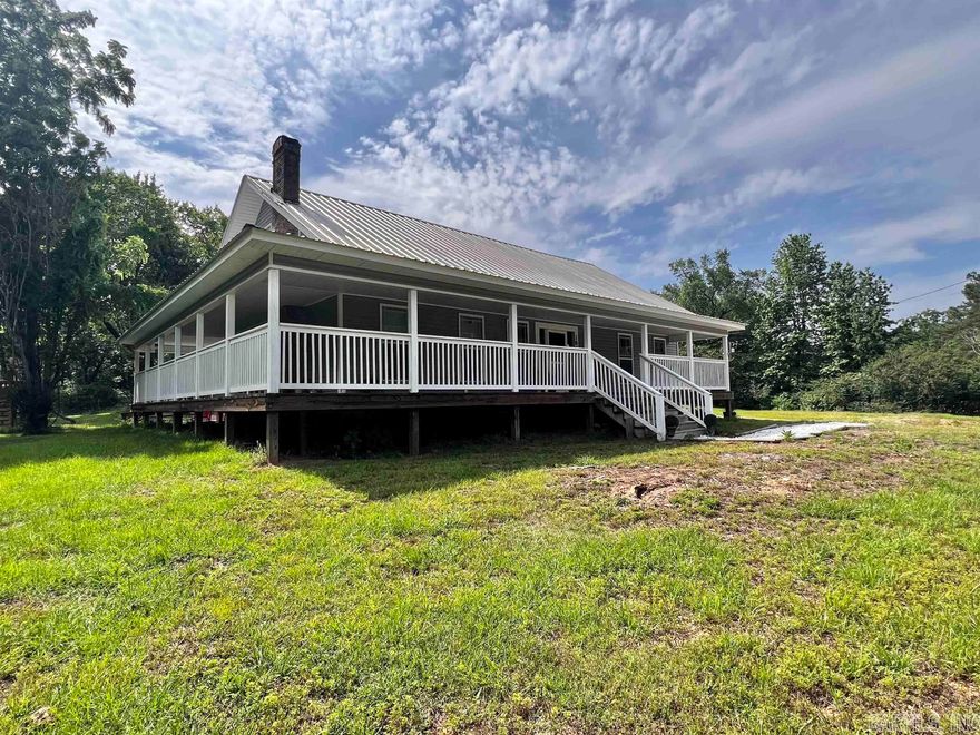 COMPLETELY REMODELED! This is a beautiful 3 bed, 2.5 bath two-story home on a 3.18 +/- acre lot that has been gutted and completely remodeled with new wiring, floors, walls, doors, metal roof, and all the finishes! With over 2500 sq ft. this home features a wrap around porch, a newly remodeled kitchen with concrete countertops, and the primary bath features a custom built rock walk in shower. Upstairs hosts the perfect den or game room area and includes a work out/crafting room or make it into another bedroom. Plenty of space to create this home into your very own masterpiece! Located near Murfreesboro Diamond Mine, Swaha, Lake Greeson, and more!