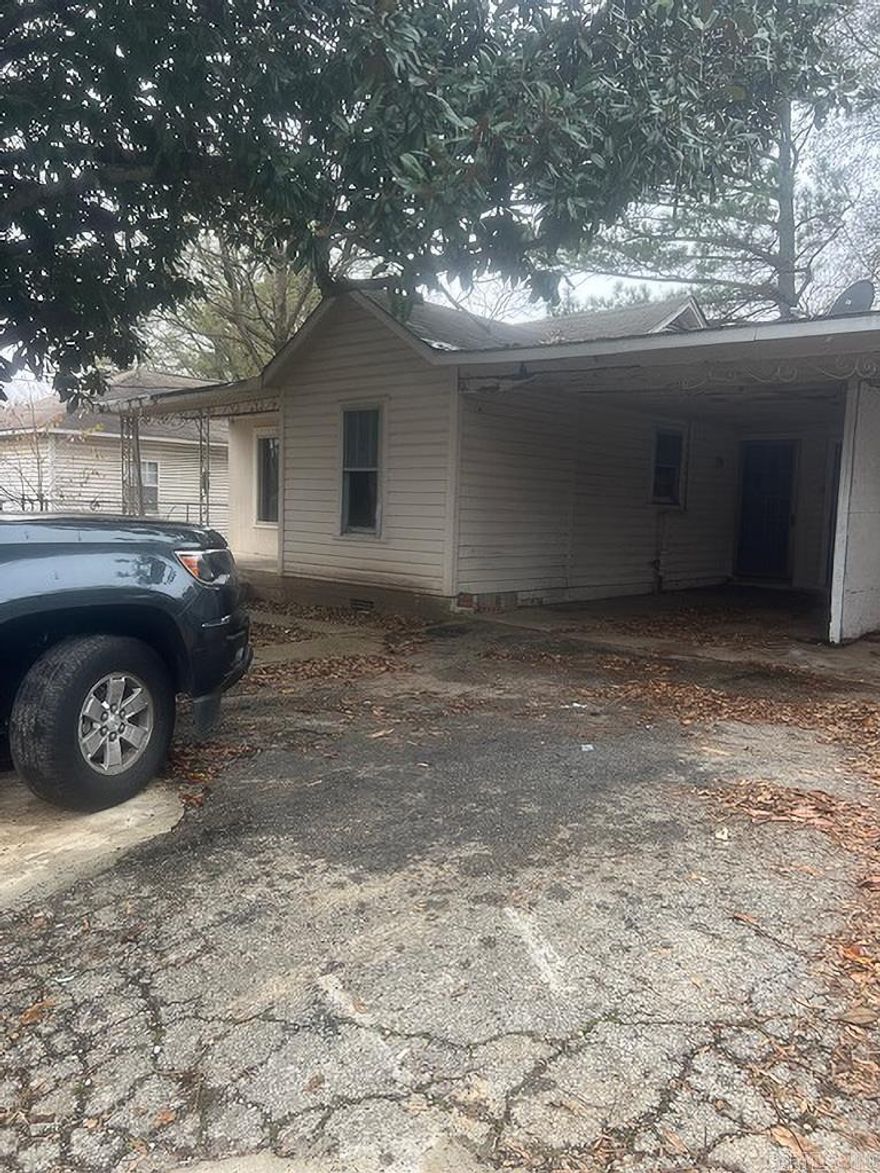 Two houses on one big lot.   Both have 2 bedrooms and 1 bath.  Both units  are rented ($350 & $400) Both are occupied and have to be shown by appointment only.