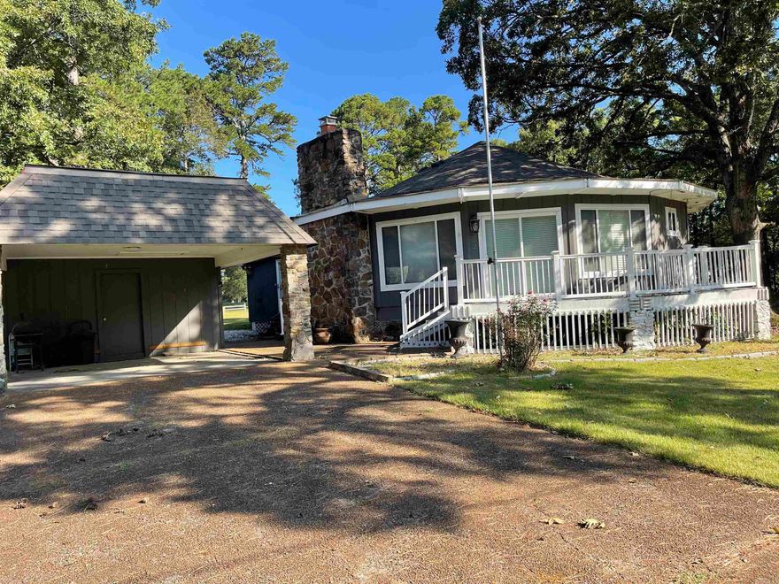 Welcome to your new oasis.  Located on Indian Hills Golf Course, this charming home offers a unique opportunity to create your dream residence. Although in need some of repairs, this property is being offered at a discounted price, allowing you to personalize it to your exact tastes & requirements. Nestled amidst the lush greenery, this property features a green house, perfect for those with a passion for gardening or growing your own organic produce. Additionally, a separate storage building provides ample space to store all your outdoor equipment, ensuring a clutter-free home .One of the standout features of this home is the heated & cooled sunroom, providing year-round enjoyment & serving as the perfect spot to relax & unwind while soaking in the beautiful views of the golf course. Golfers will relish the convenience of having this stunning course right in their backyard. Whether you're a golf enthusiast or simply enjoy the peaceful serenity that comes with living on a golf course, this location offers the best of both worlds.  Explore the Bay's enchanting surroundings, where Greers Ferry Lake is 10 minutes away. Hiking/Biking/ATV/UTV Trails.  DO NOT WALK ON DECK, NEEDS REPAIRS.