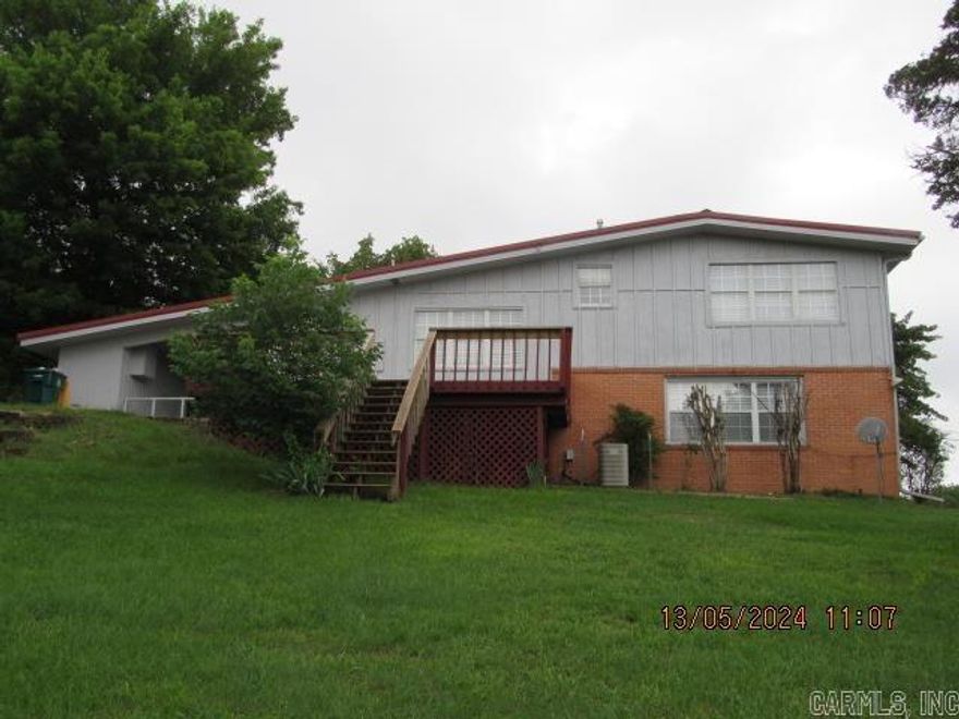 Older split-level home in the heart of Morrilton, great view off the back deck, split level 3-bedroom home, 2 living areas, laminate, tile & carpet flooring, all kitchen appliances including refrigerator, recently painted interior in 2019, 1 car carport. Recently painted exterior and updated deck in August 2022. Lawn Care Included! Small pet negotiable with a non-refundable pet fee. ***PLEASE NOTE WE DO NOT ADVERTISE ON CRAIGSLIST OR FACEBOOK MARKETPLACE. ANY LISTING OF OURS SEEN IS A SCAM!!!***