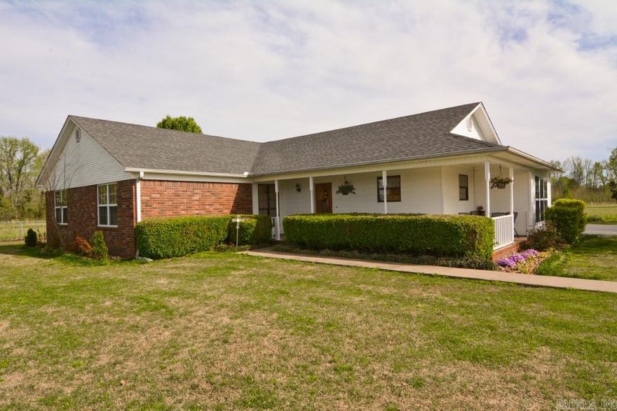 Enjoy lingering sunsets with only the deer as your neighbors. Two beautiful acres, family sized kitchen with stainless steel appliances and dramatic vaulted ceiling in the great room. Space galore, inside and out. Storm shelter stays. Work shop (750 ft) was converted in 2010 into a heated/cooled guesthouse or mother-in law quarter complete with its own kitchenette and full bath. This space is NOT counted in the square footage listed for the home.Agents please give 24 house advance notice for showings.