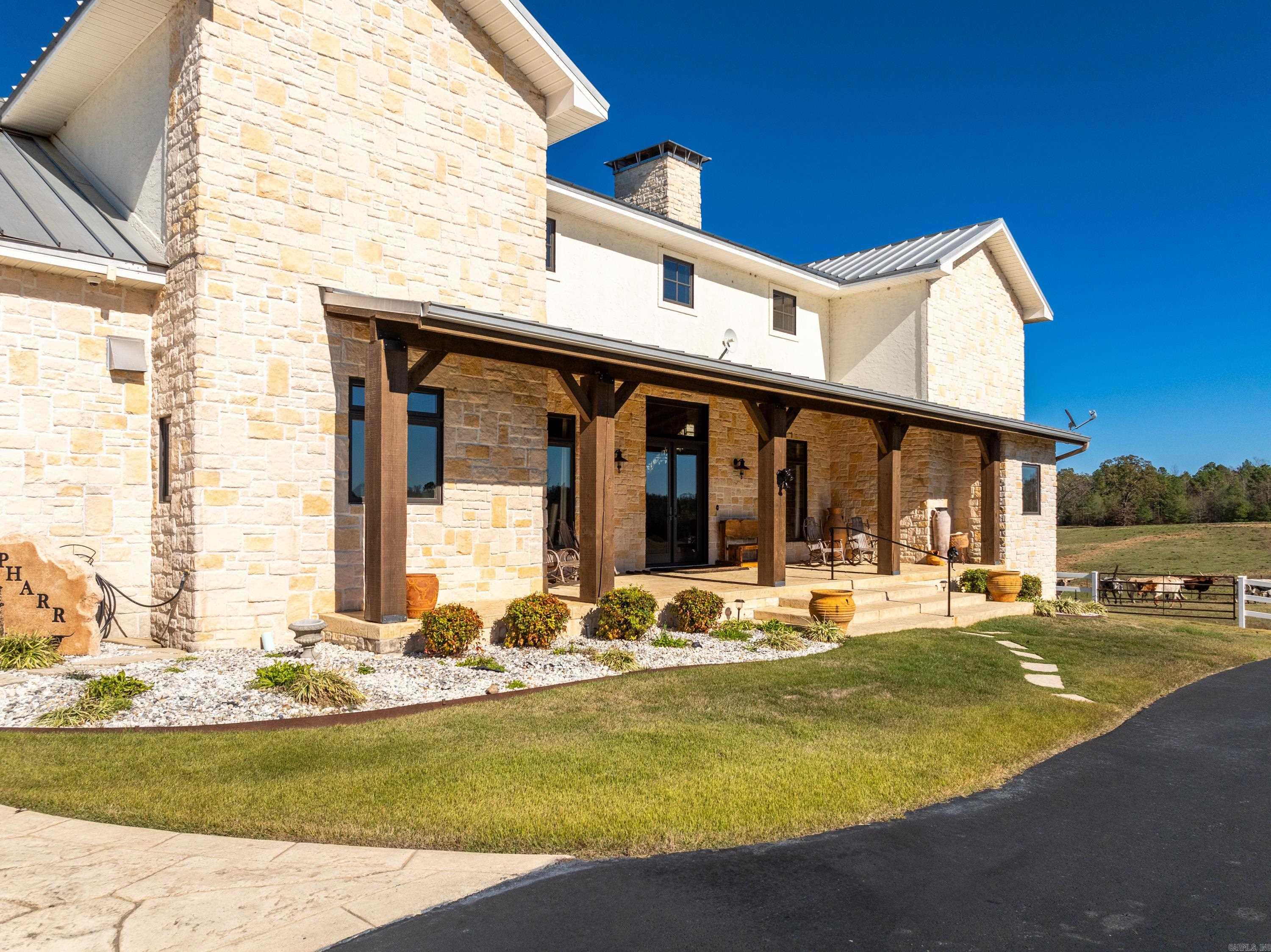 IMMACULATE HORSE/CATTLE ESTATE--FOR THOSE THAT DEMAND ONLY THE BEST--HERE IT IS!-- 40 ACRES, FENCED & CROSS FENCED (5 PASTURES 4 PONDS) NEW PAVED DRIVEWAY (AUTO GATED) LEADING TO A MODERN COUNTRY CUSTOM HOME 4348 SQ FT--4 BEDROOMS, 2-1/2 BATHS BUILT IN 2007--UPDATED -- WITH HIGH QUALITY FINISHES, VIKING APPLIANCES, HARDWOOD FLOORING, ARCHED DOORWAYS, CATHEDRAL CEILINGS ACCENTED WITH SOLID WOOD BEAMS, TWO STORY AUSTIN STONE LIVING ROOM FIREPLACE, MASTER SUITE WITH TREY CEILINGS-SHOWER WITH BODY JETS, STEAM, AIR SOAKER TUB, OVERSIZED WALK IN CLOSET, OFFICE (4TH BR) WITH SAFE ROOM, LARGE OVERSIZED GARAGE, LARGE VERANDA ACROSS THE BACK OF THE HOUSE FOR ENTERTAINING & OUTDOOR GRILLING ALL WITH BREATHTAKING MOUNTAIN VIEWS. 4 STALL HORSE BARN WITH TACK ROOM, STORAGE ROOM, WORK AREA, 3/4 BATH, 13 FOOT LEAN TOO ON FRONT & SIDE. CATTLE WORKING PIN WITH HEAD SHOOT--ALL JUST WAITING FOR THE NEXT OWNER.