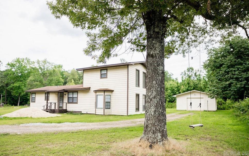 Tucked away on a quiet dead-end road, this beautifully updated 3-bedroom, 2-bath home offers the perfect blend of comfort, privacy, and functionality. Situated on 2 serene acres, the property includes a spacious 18x22 shop—ideal for hobbies, storage, or a home-based business. Inside, you'll find a fully updated interior featuring modern finishes, fresh paint, and an open, inviting layout. The master suite is located upstairs, offering a private retreat with ample space and comfort. Whether you're relaxing indoors or enjoying the wide-open outdoor space, this home is ready to meet your lifestyle needs. This move-in-ready property offers the peace and space of country living while keeping modern convenience close at hand. Don’t miss the opportunity to make it yours—schedule your private tour today!