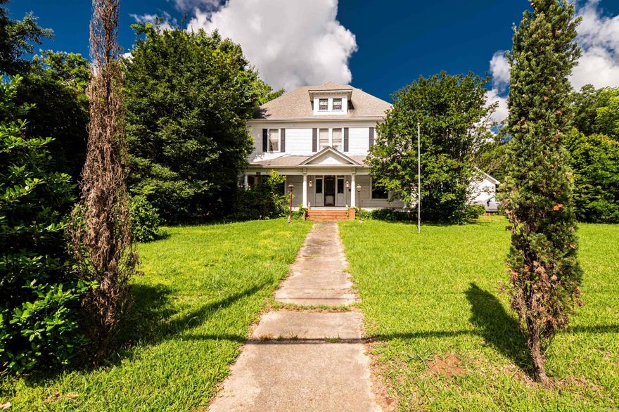 This beautiful piece of history in Monticello Ar is a masterpiece. With 4348 sq feet of heated and cooled living area, you will not run out of room. The home has a very spacious 3 bedrooms, 2 bath rooms, multiple sitting rooms, a formal dining room and much more. The house feature tall ceilings and 4 fireplaces, yes 4 fireplaces. Being built in the year of 1900 this makes it one of, if not the oldest homes in Monticello that is still standing and full of history. With only one family owning this property until the current owner, there is much of this home that has been preserved to stay original. Enjoy the backyard, gazebo, and the old cabin that is tucked away right in the middle of town. This home would be perfect form somebody who truly enjoys history, older homes, or could make a very special getaway/short term rental. Call today to schedule a tour.