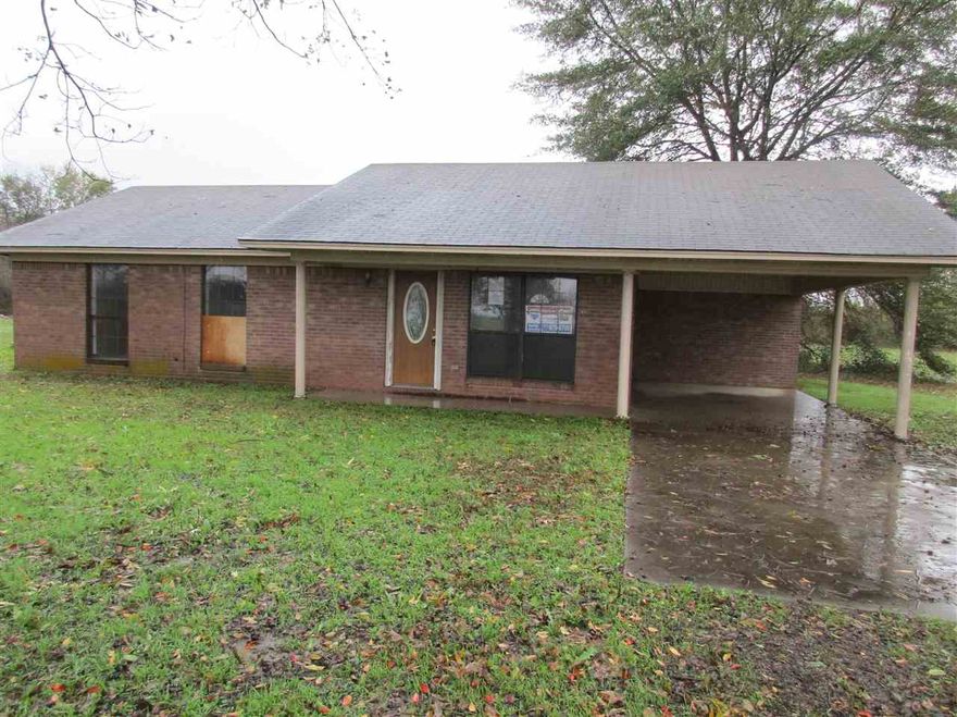 Brick home located in Altheimer, AR.  This home has 3  bedrooms and 2 baths, 1 car carport.  Kitchen has lots of cabinets.  This home sits on 1 acre.   **Seller is “Secretary of Agriculture”.  Seller to convey title via a quit claim/non-warranty deed ONLY.