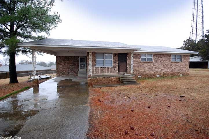 Lots of room in this home. Large sun room, formal living room, kitchen with dining room. NEW appliances, paint, carpet, ceiling fans, lighting & counter tops. New faucets in kitchen & bathroom. Bathrooms are being remodeled. Lots of space outside for a garden, there is a large out building with overhead door and a large workshop. Also has a storm cellar.