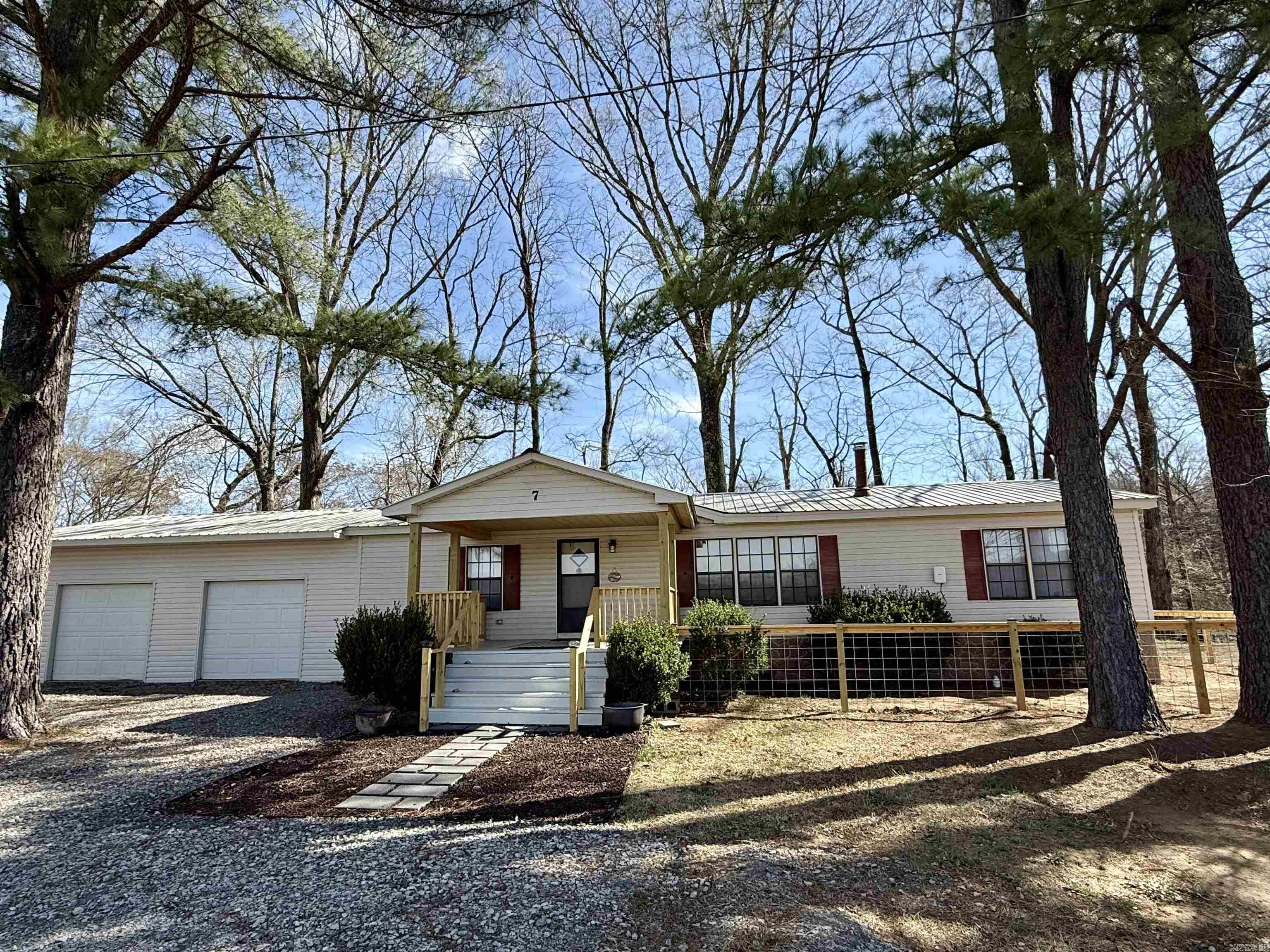 Set back on 1.79 acres along the Little Red River, this property is the perfect fisherman's getaway! This fully furnished home is a short drive to town, but feels miles from civilization by offering stunning river front views and undeveloped land right out your back door! This home boasts many appealing features such as a new soaking tub with its own instant water heater, and new large sliding doors out to a brand new back deck perfect for enjoying the river views whether you're inside or outside! Each of the three bedrooms includes walk-in closets and the attached two car garage provides loads of added storage space for all of your river accessories! Call for a showing today!