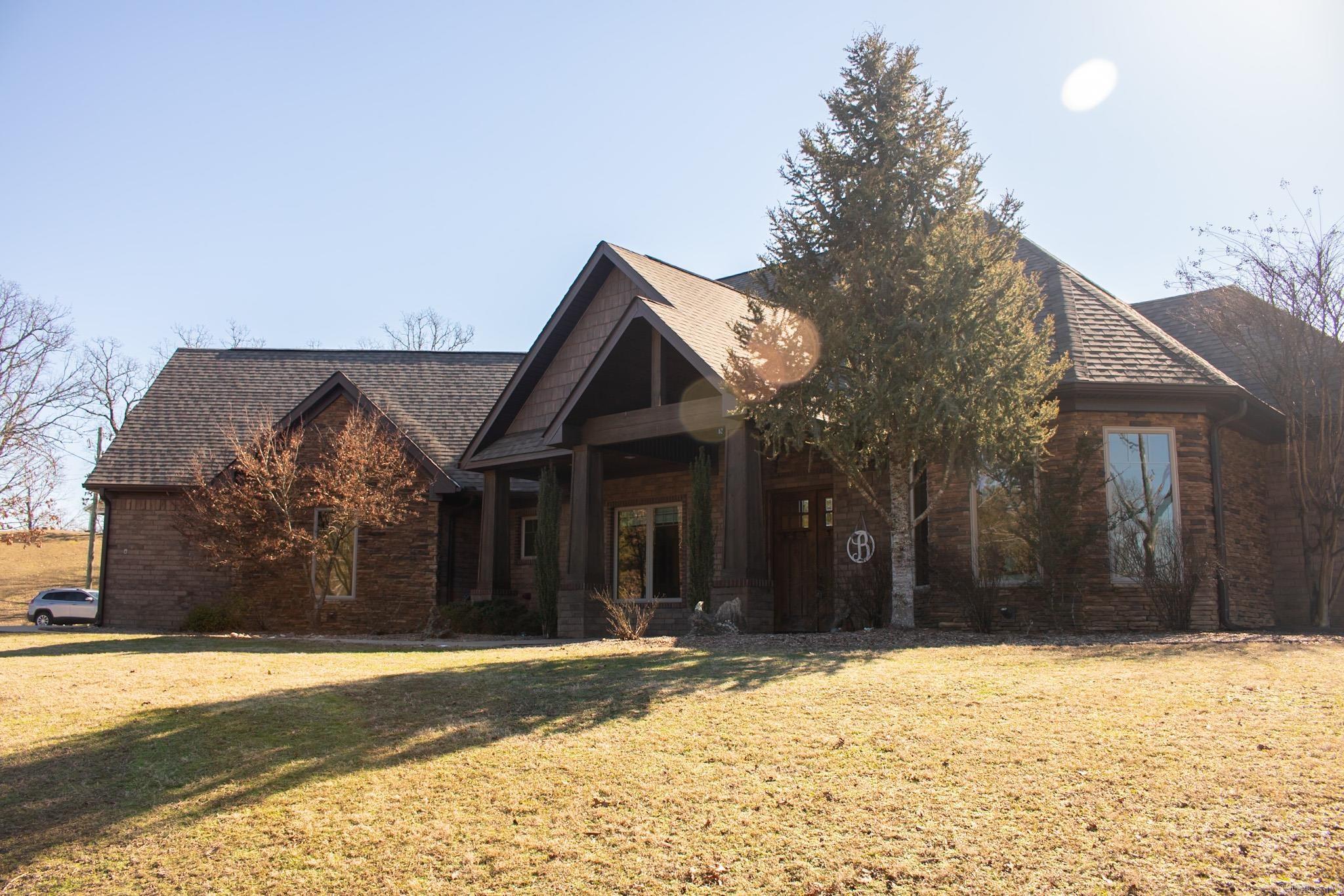 DISCOVER THE PERFECT BLEND OF ELEGANCE AND COMFORT IN THIS STUNNING 5 BEDROOM, 3.5 BATH BRICK HOME NESTLED ON A SPRAWLING 3.24 ACRES. STEP INSIDE TO AN INVITING OPEN CONCEPT LIVING AREA THAT CONNECTS TO THE KITCHEN AND DINING SPACE. THE COZY STONE FIREPLACE IS A BEAUTIFUL FOCAL POINT FOR GATHERING AROUND ON CHILLY EVENINGS. THE GOURMET KITCHEN BOASTS GRANITE COUNTERS, STAINLESS APPLIANCES INCLUDING AN OVERSIZED COMMERCIAL REFRIGERATOR AND FREEZER, BREAKFAST BAR, UNDER COUNTER ICE MAKER. LUXURIOUS MASTER SUITE COMPLETE WITH A HUGE MASTER BATH AND WALK IN CLOSET. WITH FOUR ADDITIONAL BEDROOMS, THERE'S PLENTY OF ROOM FOR FAMILY AND GUESTS. THIS HOME FEATURES A SPACIOUS OFFICE, BIG BONUS ROOM THAT CAN BE A PLAYROOM, MEDIA ROOM OR TAILORED TO YOUR NEEDS. STEP OUTSIDE TO YOUR OWN PRIVATE OASIS! ENJOY SUMMER DAYS IN THE ABOVE GROUND POOL SURROUNDED BY A BEAUTIFUL DECK AND TIKI BAR, OR UNWIND ON THE COVERED PATIO WITH A STUNNING WOOD CEILING, PERFECT FOR ENTERTAINING AND RELAXATION. LOCATED IN A PRIME AREA, THIS HOME IS CONVENIENTLY SITUATED NEAR THE VIBRANT COMMUNITIES OF HOT SPRINGS AND BENTON, OFFERING EASY ACCESS TO SHOPPING, DINING AND RECREATIONAL ACTIVITIES. TRULY MOVE IN READY!