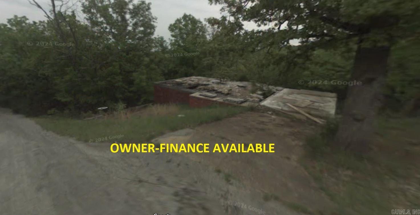 Owner-finance for easy terms. Stellar deal on a partially developed home! Concrete is poured for the driveway and garage. Crawlspace brick foundation already set up. Utilities may be present as well. The work that has already been done and remains of previous home is worth well over 70k in development savings. Cash buyers can pay by debit or credit card as well. Nice size lot as well. Owner/agent. Finance is an extra $300 with no interest or prepayment penalty. 10 months at $520 and closing costs are included. Buyer responsible for any/all taxes and lot sold "as-is". Parcel ID# 306-00419-000