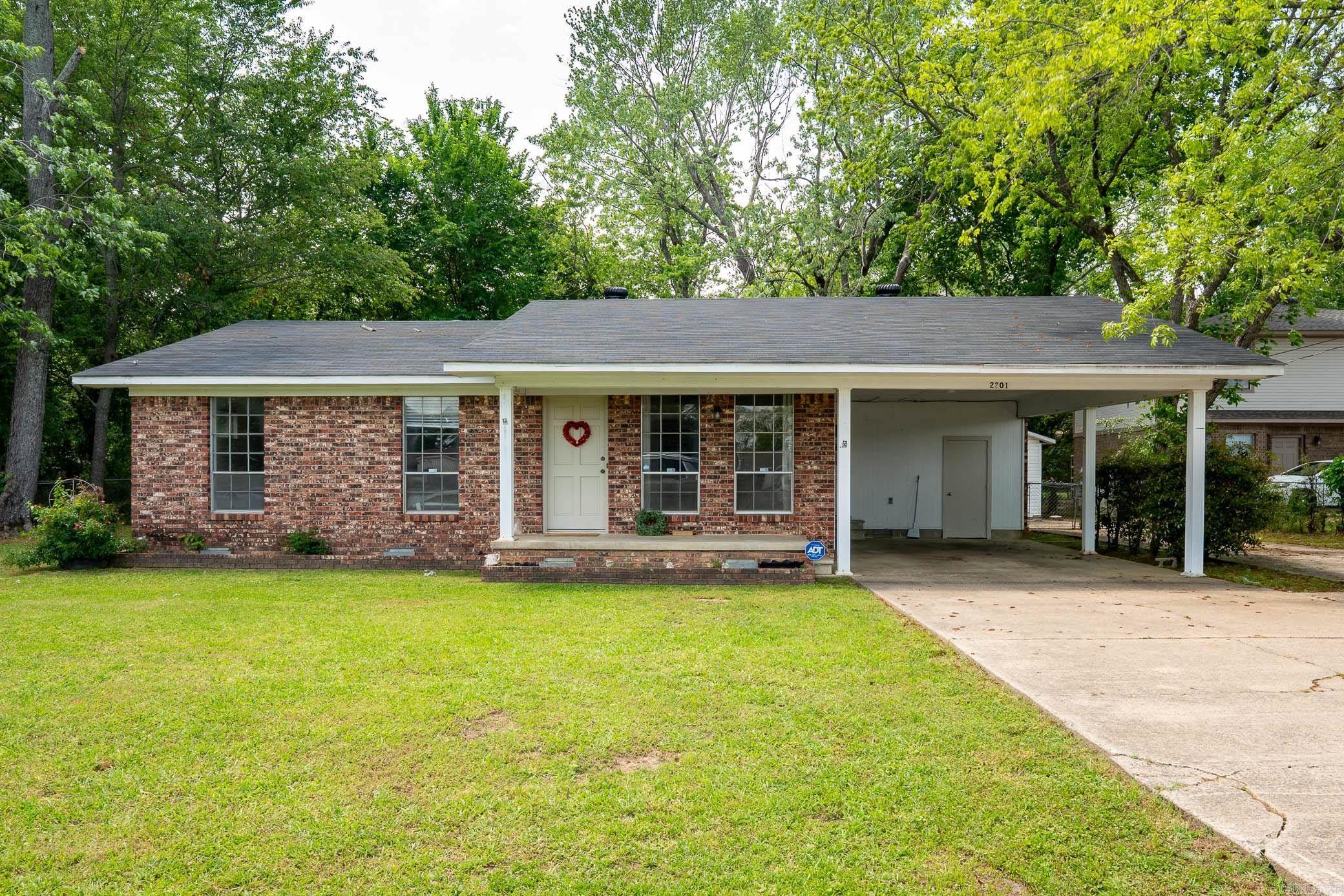 Investment opportunity or perfect starter home! This beautifully updated 3-bedroom, 2-bath property is move-in ready and income-producing, offering both immediate returns and long-term potential. Located in the heart of Conway, just minutes from downtown, shopping, and local colleges, this home is ideally situated for tenants or owners seeking convenience and comfort. Recent updates include a brand new HVAC system, new hot water heater, new roof, updated plumbing and electrical systems, new light fixtures, fresh paint throughout, and new flooring. An ADT security system is also installed for peace of mind. The detached garage already has utilities connected—offering a unique opportunity to convert it into an additional rental unit or guest house. The spacious lot provides plenty of room to expand or even build another investment property. Call Meadow or Adrian for more information!