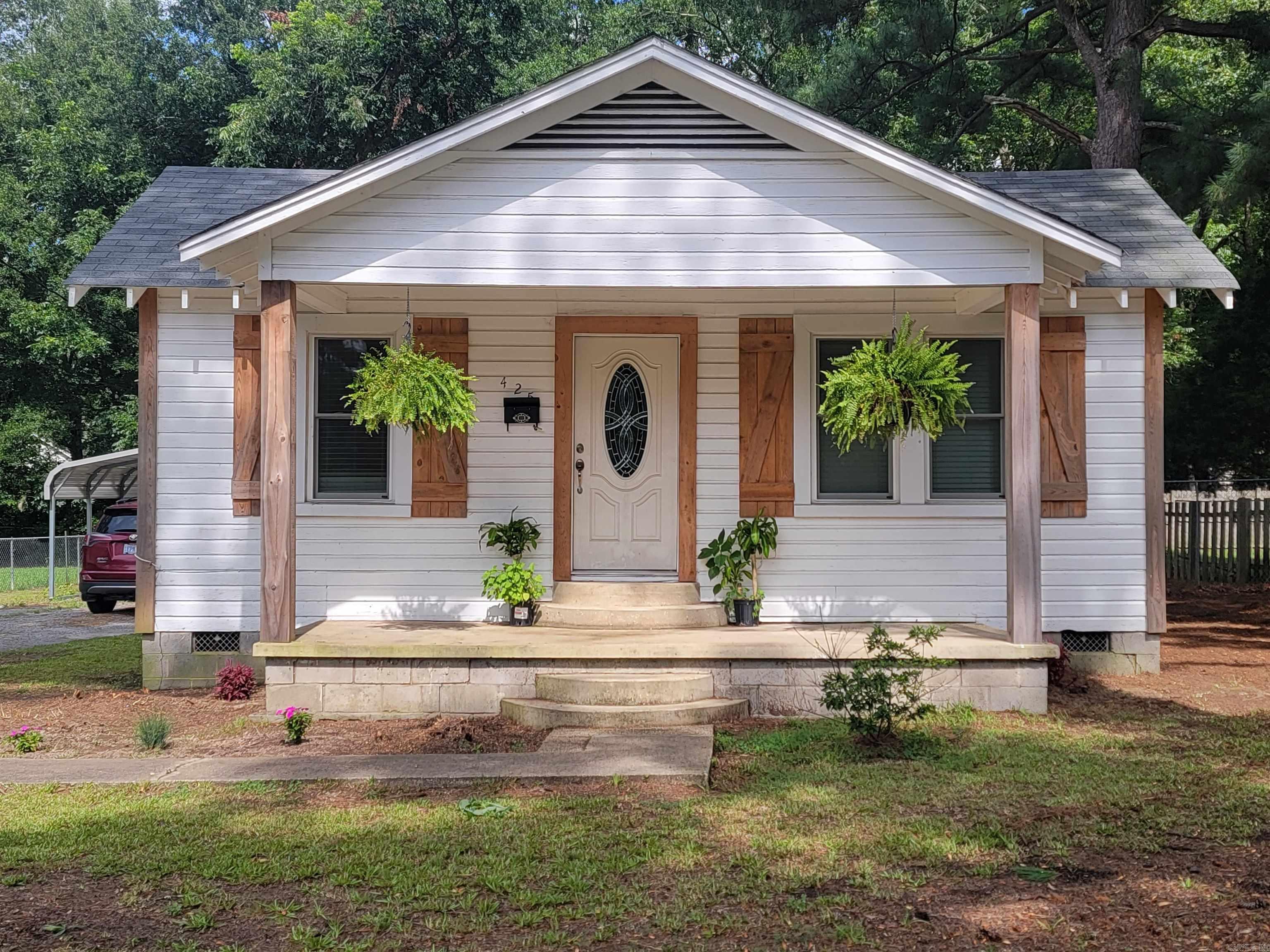 Very well maintained and updated home in the heart of Monticello! Original hardwood floors in parts of the home and new flooring in the kitchen, laundry room, and master bath! New cabinets and counter tops in the kitchen along with a new farm house sink! 14X20 storage building with electricity and a lean-to! Fenced in back yard! Open floor plan and the beautiful color theme set this home off! This home is in a rural development are and would qualify for ZERO down!!