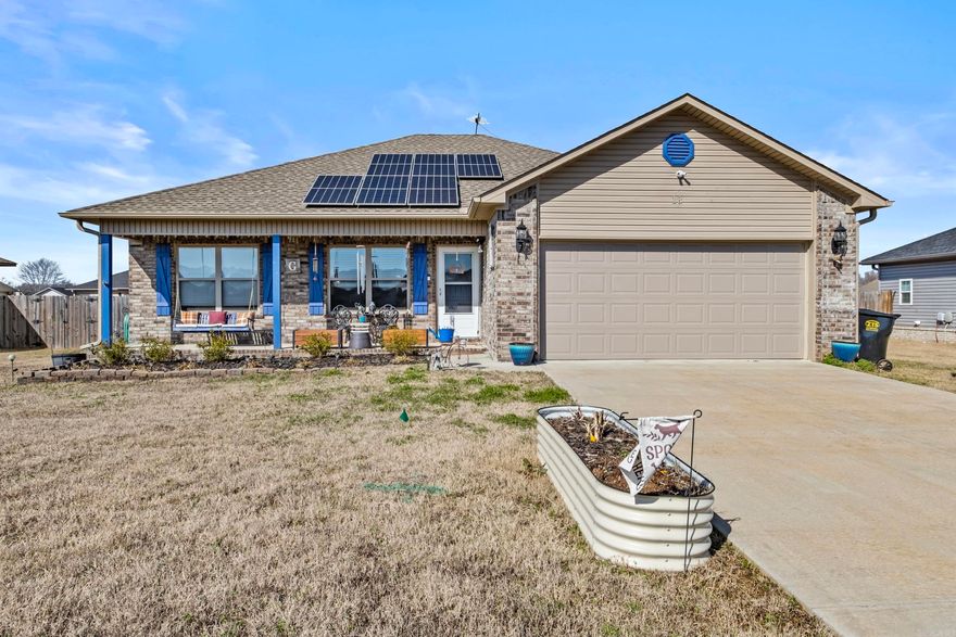 Welcome home to this beautifully updated, all-electric property in a prime location! As an added bonus, the SELLER WILL PAY OFF SOLAR PANEL CONTRACT at closing, ensuring minimal electric bills. This exceptional home offers an open-concept living, dining, and kitchen area with vaulted ceilings, creating a bright and airy feel throughout. The modern kitchen is a chef’s delight with an air fryer microwave, farmhouse sink, slab granite tops, and a movable island cabinet—plus, you'll love that there’s absolutely no carpet anywhere!The super sweet primary suite boasts a tray ceiling, twin sinks on a granite-topped vanity, and a huge tiled shower with a rain head for a spa-like experience. Step outside to enjoy the expansive covered back porch (complete with shades) and a private, wood-fenced backyard—perfect for relaxing evenings and gatherings. Additional highlights include a new roof (2023), upgraded storm doors at the front and back, and exterior lighting that stays with the home. Plus, choose your style—the seller is willing to repaint the shutters to your color of choice or leave them as is. Check out the 3D Virtual Tour. Floor plan, disclosure, and appraiser SF sketch in documents!