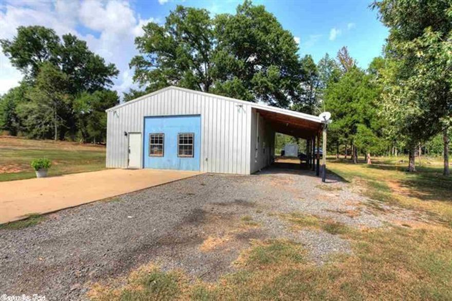 26 acres, some cleared some wooded and partially fenced comes with a 1500 sq. ft. metal shop containing approximately 900 sq. ft. of living quarters. City water is across the road if you want to hook up to Vilonia water. Living quarters in the shop. AC unit keeps the living area hot or cold.50 % of Minerals owned by seller will transfer to new owner.