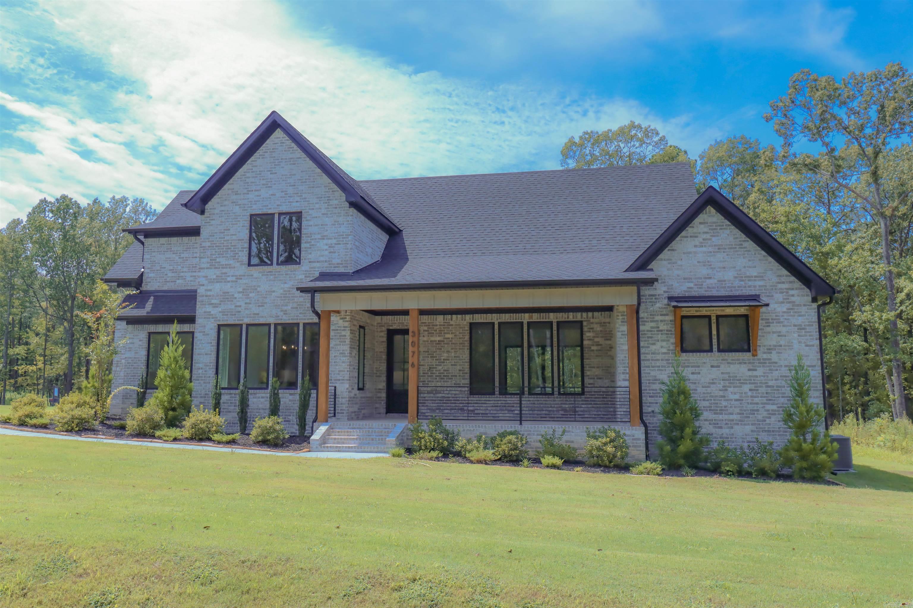 Situated on a corner lot of just over an acre in the highly sought-after Avilla Manor subdivision, this nearly 3,200 SqFt home offers a thoughtful blend of elegance, comfort, and practicality. Beautiful landscaping and a sprinkler system provide curb appeal that sets the tone before you even step inside. The interior is filled with soft, natural light thanks to Anderson Low-E casement windows, highlighting the homeās open floor plan and refined finishes. The kitchen features granite countertops, a large walk-in pantry, and plenty of room for gathering, while the living room is anchored by a cozy gas log fireplace. The primary suite showcases a vaulted ceiling and a spa-inspired bath with a custom tiled walk-in shower. Upstairs, youāll find three spacious bedrooms and a versatile bonus room, while downstairs offers a dedicated office and a large mudroom. Throughout the home, youāll notice custom built-ins, wood flooring, and energy-efficient details like foam insulation and a tankless water heater. Inviting outdoor living with a covered back porch and an expansive lotāperfect for a future pool, shop, or simply enjoying the private setting, with a 3-car garage completing the package.