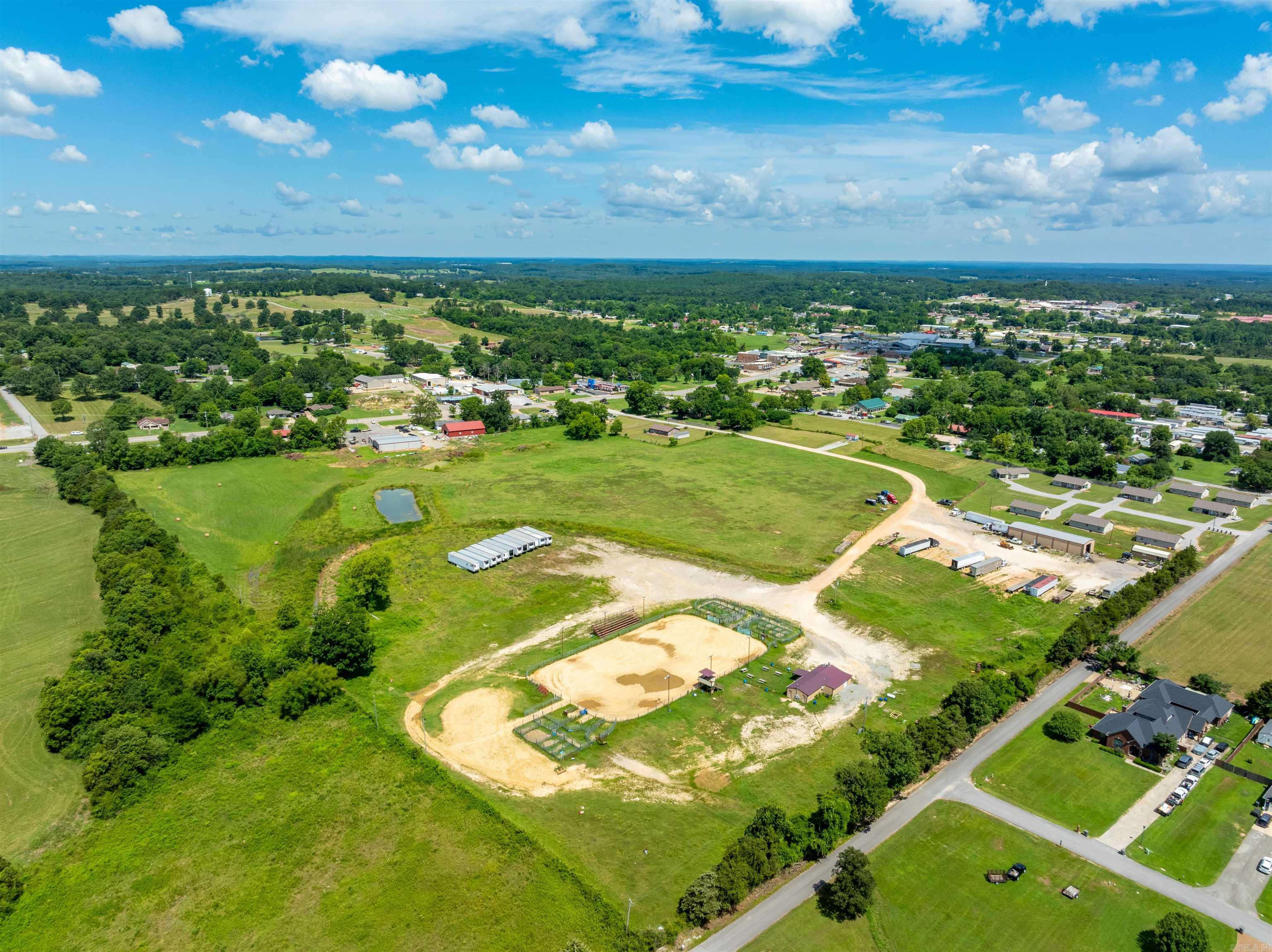 Own a piece of Cave City history! This 26± acre property includes the fully operational Cave City Rodeo Arena and a successful trucking company. The arena features working pens, chutes, concession stand with equipment, and access from both Hwy 167 and Welcome Ln. Thousands attend events here annually. City water and sewer available. The included trucking business operates from an onsite shop and has a fleet including Peterbilts, Kenworths, Internationals, Volvos, and 17 reefer trailers (2008–2019). NDA and proof of funds/pre-qualification required for financials. Ideal for investors, developers, or anyone looking for commercial, recreational, or expansion opportunities. Prime location with endless potential.