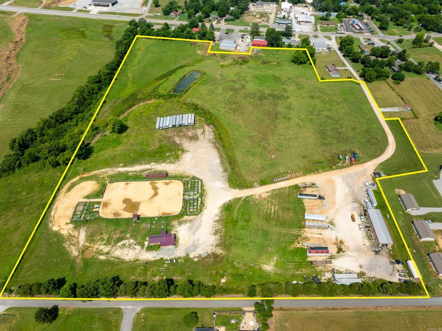 26 +/- Acres Development Land with City Utilities & Hwy 167 Exposure — Former Cave City Rodeo Arena (Cave City, AR) Adjacent to Double Oaks (Patterson Addition) • Owner Financing Available  What was once the Cave City Rodeo Arena has now closed—opening a rare chance to acquire 26 +/- acres of prime, in-town development land. Set just off Highway 167 (Main Street) with city sewer, city water, and electric on the property, this tract is positioned for residential, commercial, or mixed-use concepts. A city-maintained road on the backside provides easy secondary access from the Double Oaks (Patterson Addition) subdivision—ideal for phasing, traffic flow, and builder logistics.  Why this site stands out 26 +/- acres inside Cave City limits — hard to find at this scale  Utilities on site: City water, city sewer, electric (buyer to verify capacities/taps)  Dual access: Visibility approach from Hwy 167 + rear access via road from Double Oaks/Patterson Addition  Development-friendly topography with substantial road frontage  Flexible use potential: Single-family lots, townhomes/duplexes, neighborhood commercial, medical/professional offices, mini-storage, or a mixed-use plan!