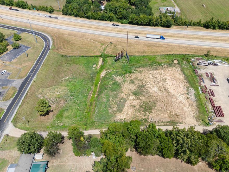 Prime 4-Acre Industrial Lot with I-40 Frontage! Exceptional opportunity to own 4 acres currently zoned Industrial, offering maximum visibility and accessibility with direct frontage along I-40. Perfect for commercial or industrial development, this property provides excellent exposure with high traffic counts and convenient highway access. Additional acreage available for purchase at an additional cost, allowing flexibility for larger projects. A rare find with endless potential for investors, developers, or business owners.