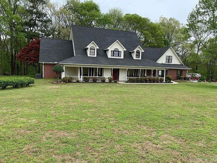 Welcome to your dream retreat in a peaceful country subdivision just 4.5 miles from downtown Nashville, 9 miles to Murfreesboro where you can enjoy the beautiful Lake Greeson or dig for diamonds at the Crater of Diamond State Park.  This beautifully remodeled home sits on a spacious 4.5+ acre lot featuring a serene creek that flows year round - perfect for nature lovers and those seeking tranquility.  Inside you will find - 4 spacious bedrooms and 4 1/2 bathrooms, a dedicated home office and a bonus room above the garage - ideal for a playroom/guest suite or media space.  The open concept living areas are filled with natural light and modern finishes, creating a warm and inviting atmosphere.  Step outside to enjoy the expansive deck and generous porch space, perfect for entertaining and relaxing with a morning cup of coffee.  A detached shop offers ample space for hobbies, storage or a home business.  Whether you are looking for privacy, space or proximity to town, this property offers it all.  Don't miss your chance to own a slice of Arkansas paradise!