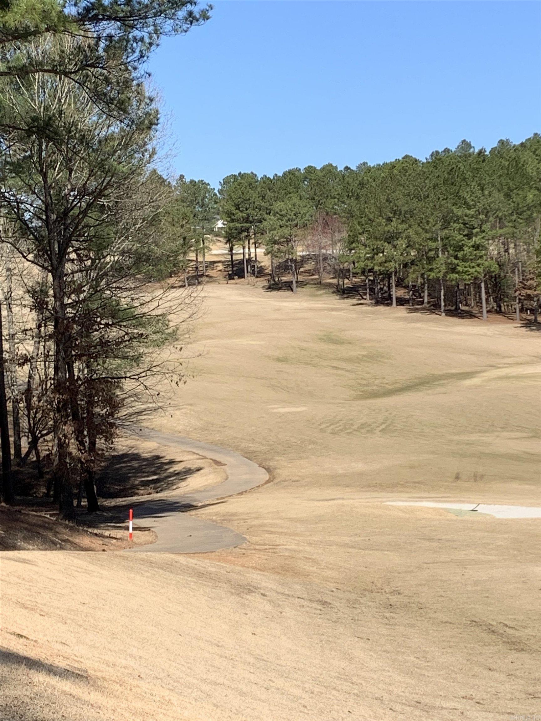 Beautiful Granada Golf Course Lot located on the #1 Fairway with amazing views! 0.40 Acre to build your dream home on one of the top 10 Golf Courses in the state. Distant views of the Granada Club House make this lot even more special. With Lake Granada just down the street enjoy your walks with great views all around! The nation's largest gated community offers 9 beautiful golf courses, 11 recreational lakes with over 30 miles of trails for walking and hiking! New buyers to the Village have a $250.00 buy in fee payable to the POA at closing.