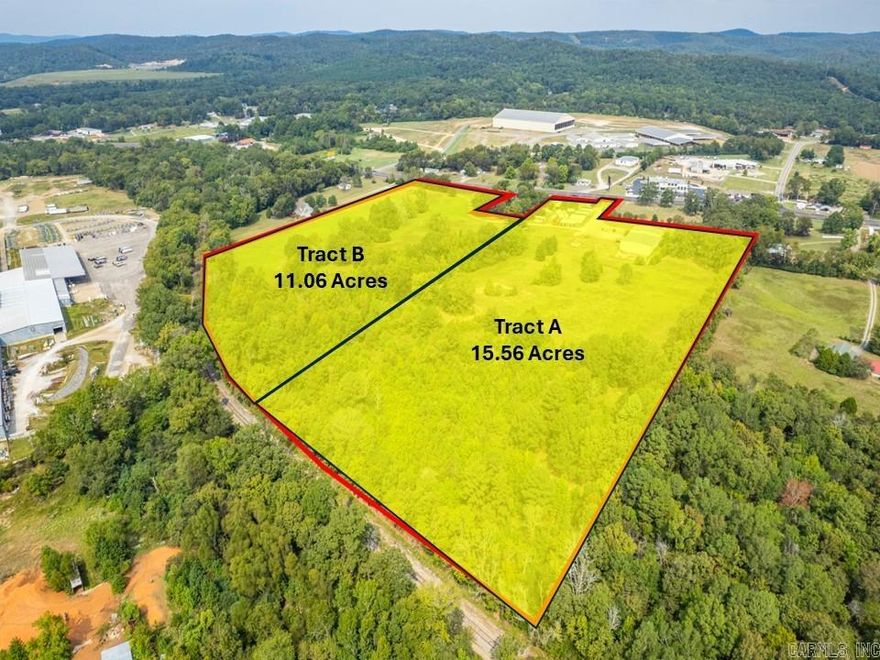 26.62+/- acres, 10,727 sf building with large shop/warehouse, 4 14'x14' over head doors, high ceilings, large office/showroom, and 1 bedroom apartment. 600+- ft of Highway 270 frontage, high traffic counts located across from the Garland County fairgrounds. This tract has an income-producing month-to-month Lease