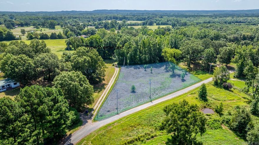 Beautiful 1.26 Acre Lot at the corner of Maple and E Maple Ln. Electric is located at the road and city water meter to the left of the property. Property was perc'd in 2007.