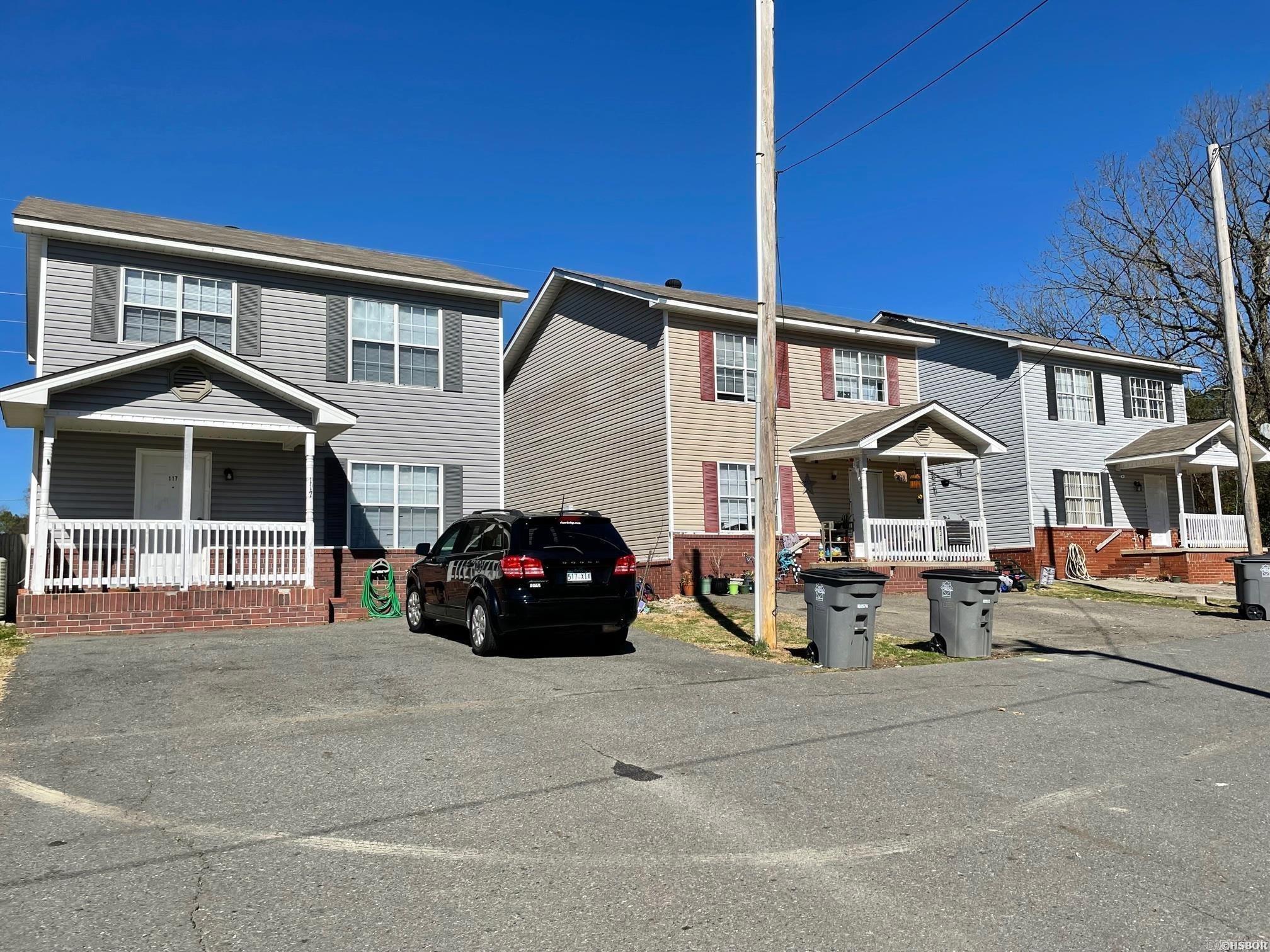 MULTI-FAMILY INVESTORS! 10 well-maintained rental units located in the center of town (behind the Walmart on Central Avenue). Situated within eye-shot of Lake Hamilton, this multi-family package is 90% occupied & currently grosses $10,300/mo. A total of 10 townhouse rental units - (6) 3BR/2.5BA single townhouses & (2) 3BR/2.5BA double townhouses. Lots of room to increase rents. Low expenses - tenants pay all utilities.