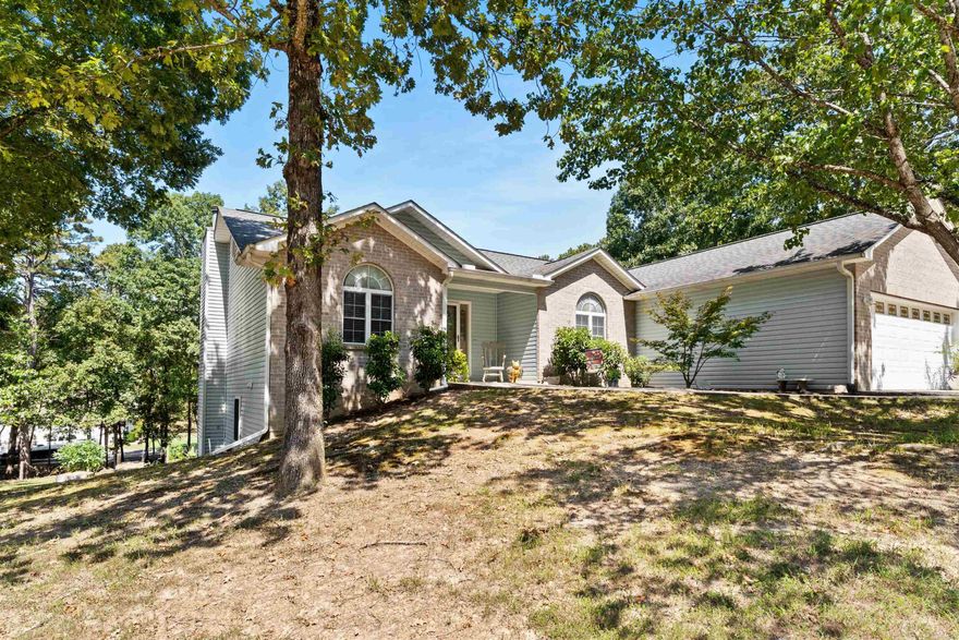 This beautiful 4-bedroom, 3-bath home on a full acre offers the best of Greers Ferry Lake livingājust 0.8 miles from Devils Fork Recreation Area. With two spacious living rooms, two full kitchens (one upstairs and one downstairs), and a private office, itās perfect for families, guests, or even a multi-generational setup. The downstairs living area features a cozy fireplace, creating the perfect spot to relax after a day on the lake. A large shop provides plenty of space for storing your boat, lake toys, or equipment, and Laceyās Narrows Marina is only about 2.5 miles away if you prefer to keep your boat in the water. Surrounded by the beauty of Greers Ferry Lakeāknown for its clear waters, excellent fishing, and endless outdoor recreationāthis property offers the perfect combination of comfort, space, and convenience for full-time living or a peaceful weekend getaway.