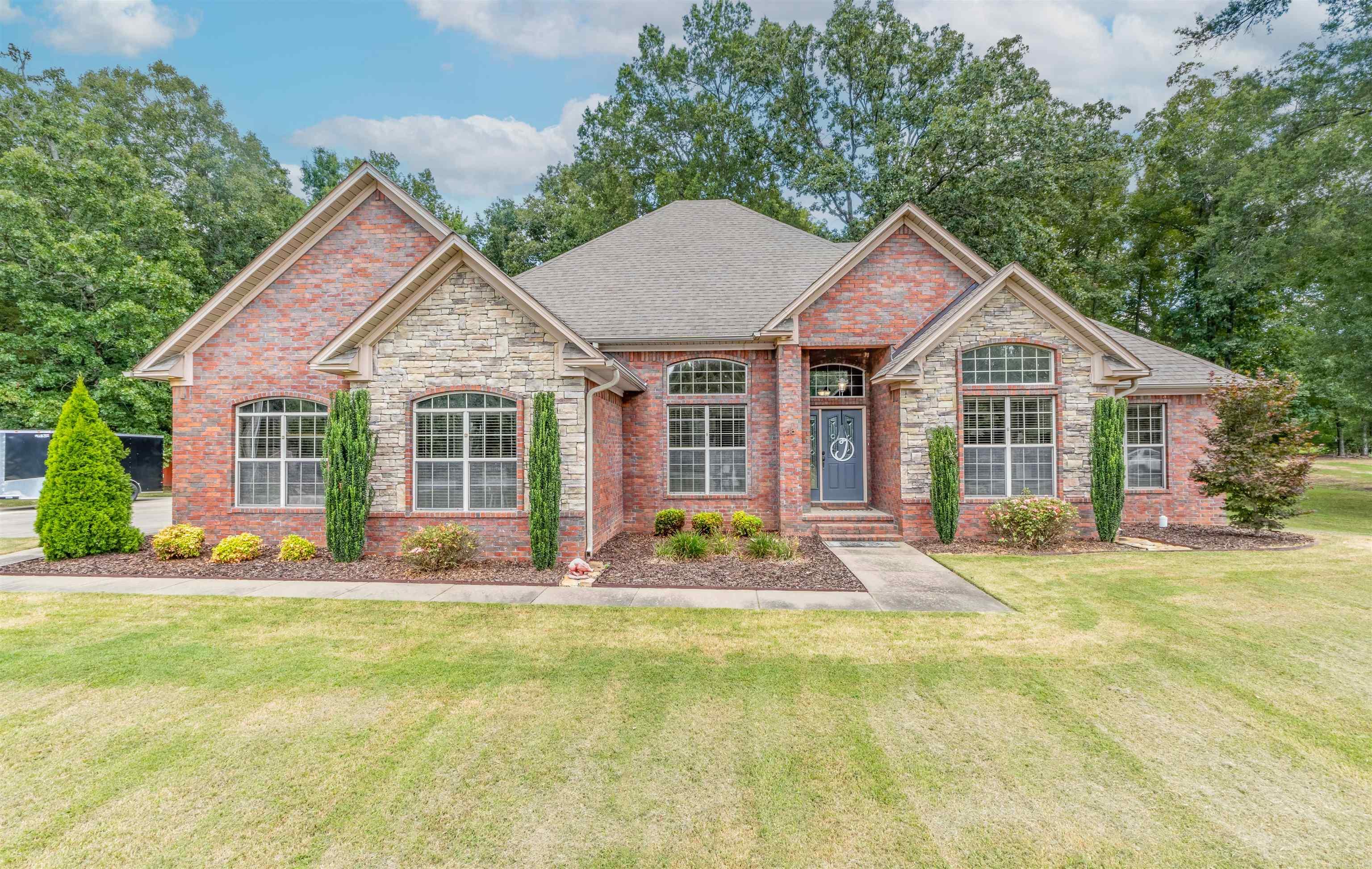 Enjoy the quiet privacy of the country just minutes from town. This beautiful 3 bdrm/2 bath home sits on .91 acre at the end of a road with a cul-de-sac. The home has stained concrete floors, a study off the living room, covered patio in back, huge master closet, a great layout for entertaining and so much more! Call to see the wonderful home today!