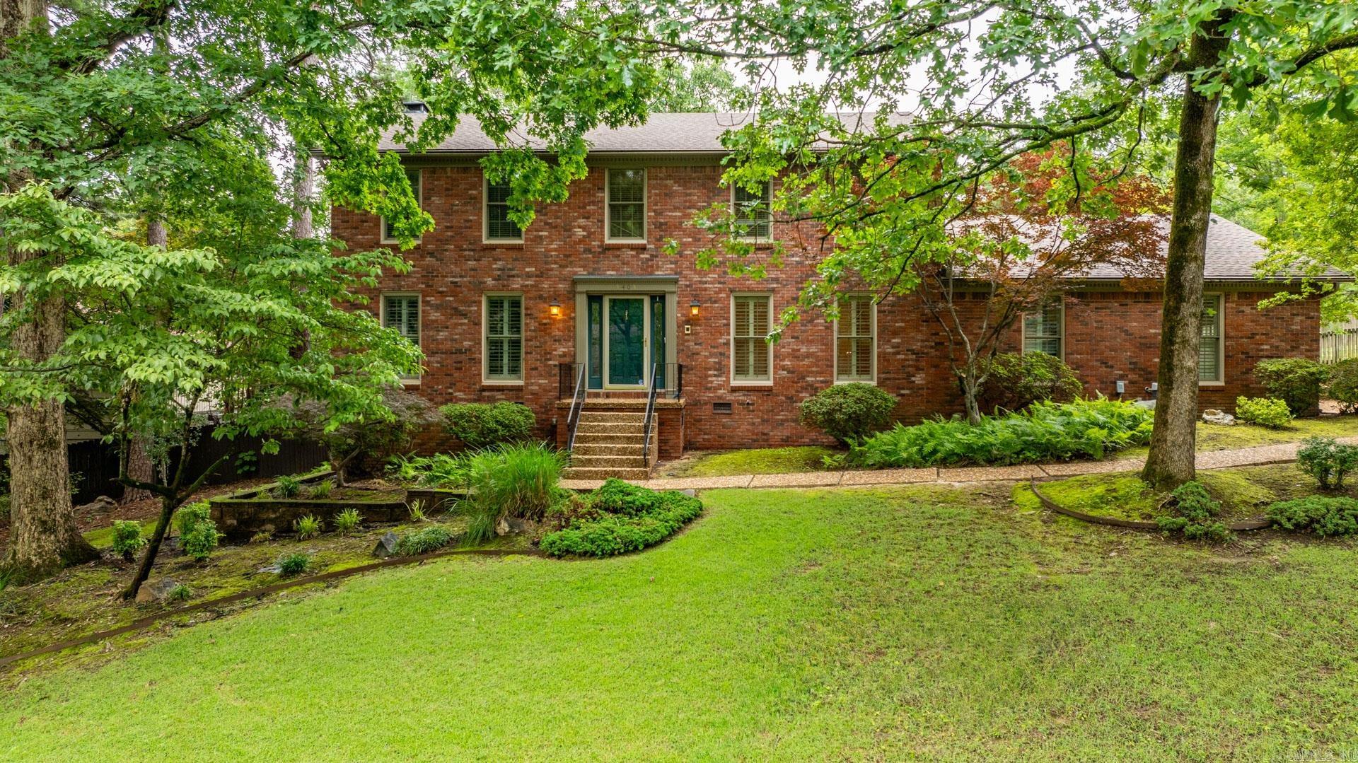 Beautiful traditional two-story brick. Handsome exterior and fantastic family floor plan. The perfect setting for family living and entertaining! Wonderful entry flanked by home office/study and large formal dining. Open living room. Inviting family Den and additional large media or game room. Excellent kitchen with quality appliances and breakfast area. Safe room and laundry located on the main level. Spacious primary suite upstairs along with three additional guest bedrooms and guest bath. Gorgeous private, landscaped back yard with sun terrace and covered patio. Two car covered parking with storage. Fantastic location.