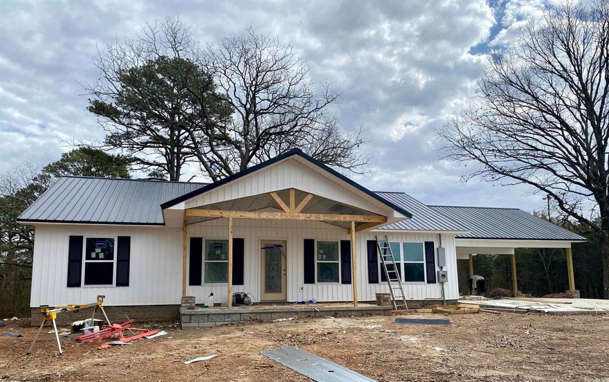 Charming new construction residence to be built on a 1.5 acre wooded lot near Lake Ludwig! Thoughtfully designed offering a split floor plan & open concept kitchen/dining/living area. Vaulted ceilings add to the charm & character this lovely property offers. Welcomed by an inviting front covered porch framed in rock & wood columns. Large breakfast bar, stainless steel appliances, & a walk-in pantry. The master offers a unique design w/ direct access to the laundry room. Act now and pick your floor coverings & paint! 1 year builders warranty. *Plans/specs may vary slightly to the finished product
