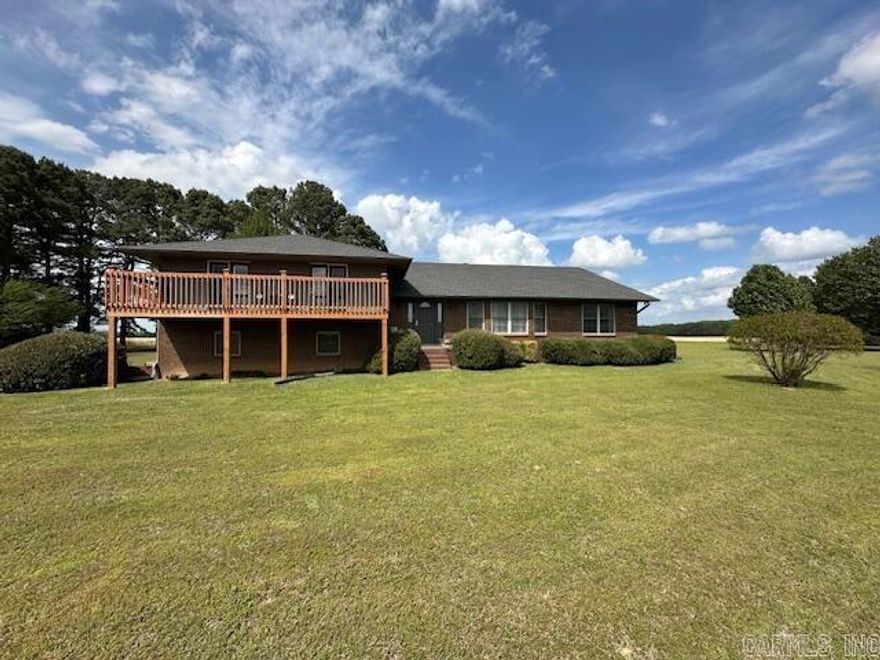 This brick home is full of character and space! Offering 4 bedrooms plus an office that could be used as a 5th bedroom, along with 2.5 baths and over 3,300 sq. ft. The spacious living room features a wood burning fireplace, perfect for relaxing or entertaining. The large kitchen boasts an abundance of cabinets, a breakfast bar, dining area and a separate formal dining room. You'll also appreciate the oversized laundry room with a half bath and utility/pantry for extra storage. All of this sits on approx. 15 beautiful acres, providing plenty of room to enjoy country living.
