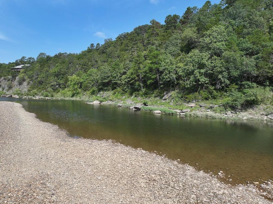Approximately 1.50± acres on the Ouachita River located at 101 Rapids Run in Sims, AR. This tract offers direct river access with a hiking trail leading to the water, a mix of cleared and wooded areas, and some existing utilities, including a septic system and well. The Dragover Recreation Area is located just before the property, and a boat take-out ramp sits to the right of the tract. Scenic views of the Ouachita Mountains and a short drive to the Ouachita National Forest add to the appeal. Buyers have the option to purchase this 1.50± acre tract or the full 3± acre property under MLS #25029845.