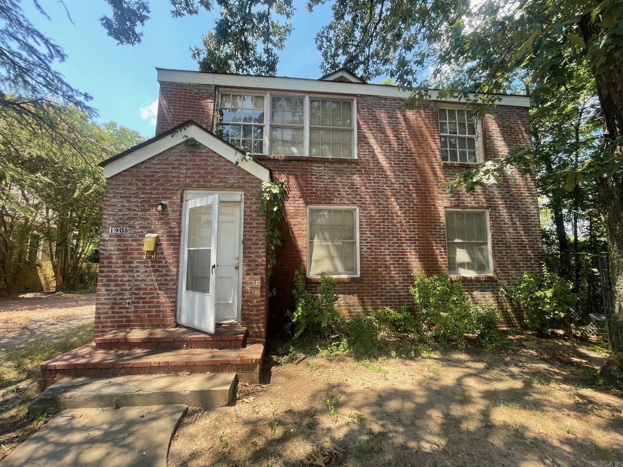 ***Back-on-the-Market due to failed Buyer's Financing.**** Duplex with lots of potential for the right investor to rehabilitate and use as investment property. Unit 1 has a nice size living room and dining area; kitchen space with laundry connections; lots of storage spaces throughout; two large bedrooms upstairs; half-bathroom on the main level and full bathroom on the second level. Unit 2 offers a living room; kitchen space with laundry connections; separate dining room; three bedrooms upstairs; half-bathroom on the primary level and two full bathrooms upstairs. Property is SOLD "AS-IS" with no Seller Repairs. AGENTS SEE CONFIDENTIAL REMARKS.