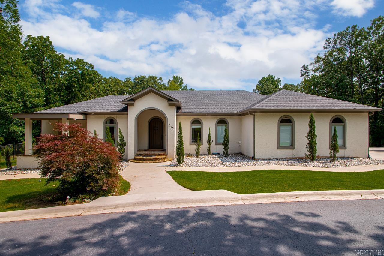 You will love this completely remodeled gorgeous home that sits on 5 acres. This property is super private and sits back off of the main road down a private drive. It features a new kitchen with all new appliances, new roof, 2 new HVAC units, new tankless water heater, new light fixtures, surround sound, new hardwood floors & interior & exterior paint throughout. The heated pool and hot tub oasis are to die for- There is also a basketball court, and a circle drive. This home is only 10 minutes to I-430.