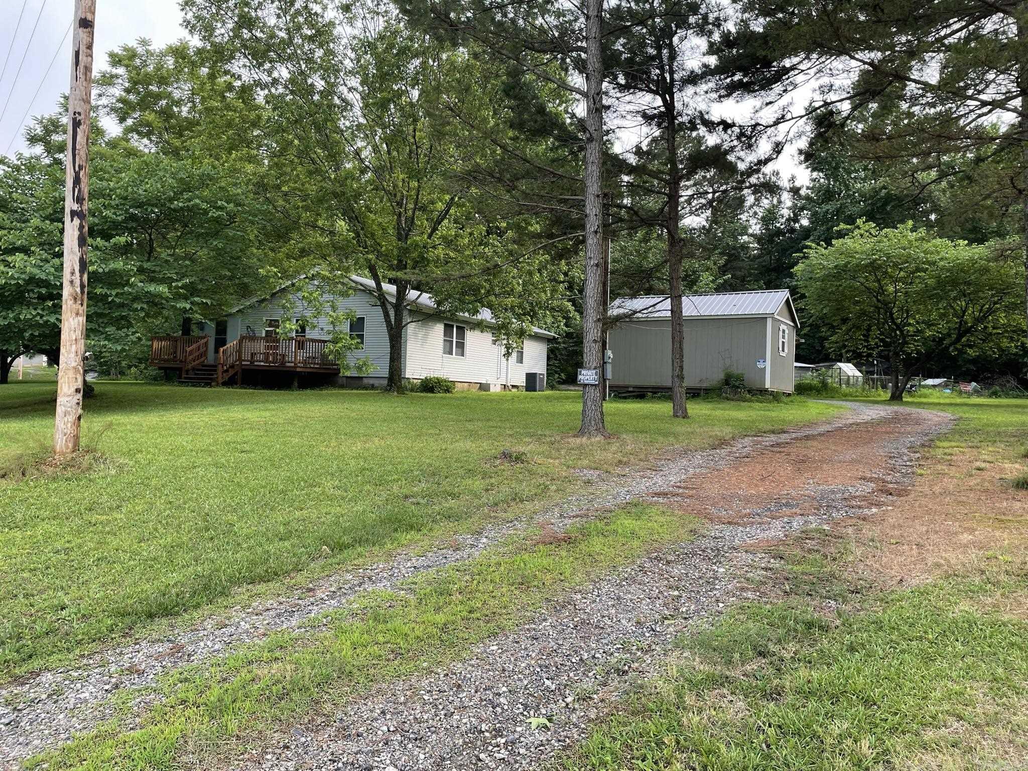 Charming 2ā4 Bedroom Home with Bonus Tiny House on 2± Acres Near National Forest & Wolf Pen Gap Trails Discover this one-of-a-kind property nestled on approximately 2 acres, perfectly located near the National Forest and the renowned Wolf Pen Gap trails. The main home offers 2ā4 bedrooms and 1 bathroom, complemented by a generous basement featuring an additional bedroom, laundry area, and abundant storage space. A cozy 1-bedroom, 1-bathroom tiny house adds versatilityāideal for guests, extended family, or rental income. An attached bonus area serves as a canning kitchen or flower nursery (your choice!), while the spacious garage/workshop provides ample room for hobbies or storage. Outdoor highlights include a chicken coop, multiple storage buildings, and plenty of open space to enjoy country living. With so many unique features, this property is a rare opportunity you wonāt want to miss. Schedule your private showing today to experience all it has to offer!
