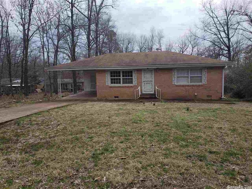 Well maintained home recently painted inside and newer wood laminate flooring in living-dining-kitchen area. Large room addn off kitchen recently made into a 3rd bdr with own 3/4 bath/laundry area. Newer 12x10 long lasting deck, workshop/storage under house and on flat lot.  New carpet in other 2 bedrooms. Tankless propane water heater, plus heat pump with gas back up.  Within just a few blocks of the park for access to Lake Sequoyah for fishing & swimming. Listed for sale also available for owner financing