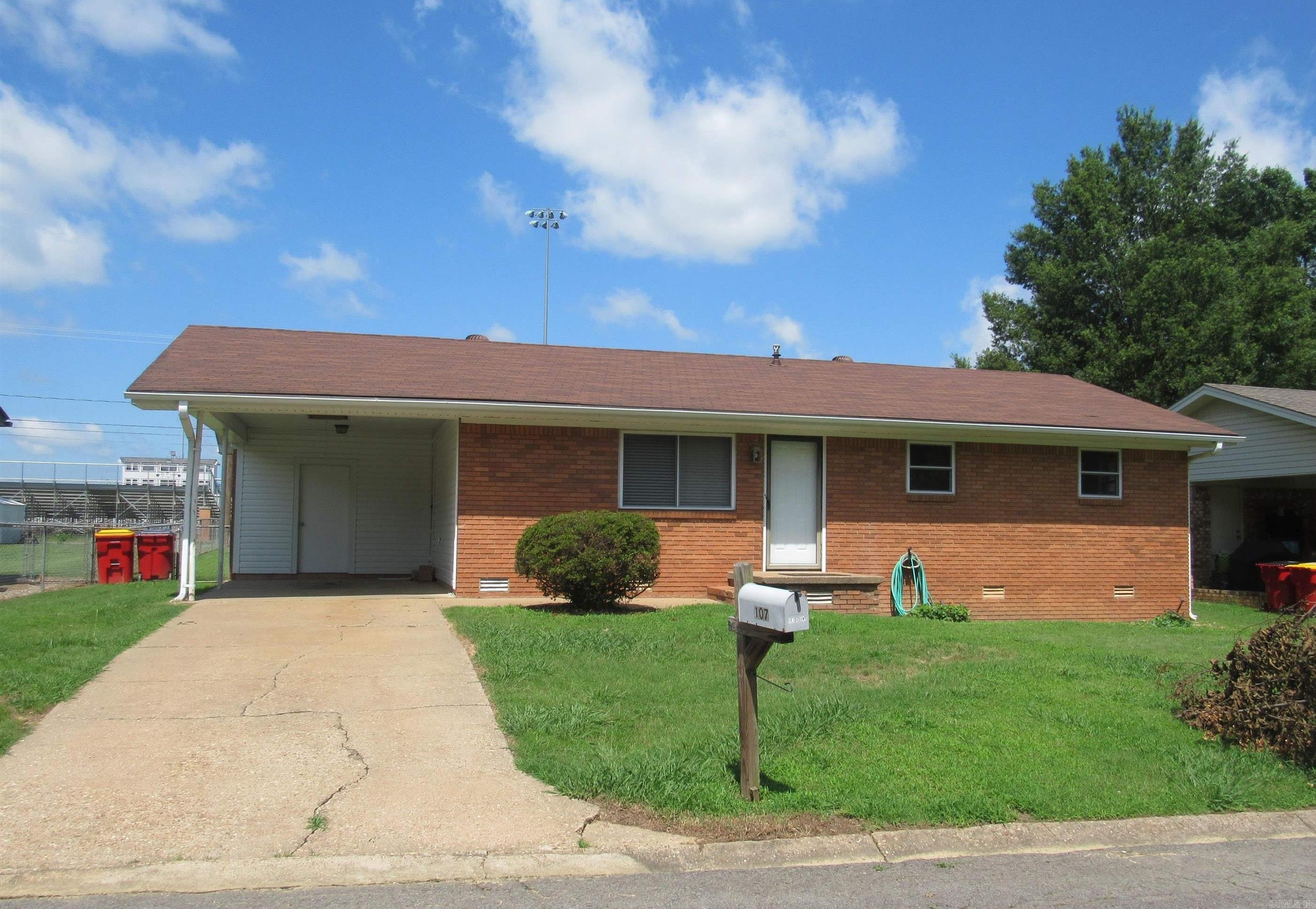 ALL BRICK HOME IS READY TO MOVE IN TO. SCRAPED OFFER POPCORN ON CEILINGS, FRESH PAINT THROUGHOUT, NEW FLOORING, CARPET, FIXTURES, FANS, NEW GRANITE COUNTER TOPS, DISHWASHER AND GAS RANGE. REPLACED BACK PART OF ROOF AND SEVERAL NEW DOORS. THERE IS ALSO A NEW TOILET AND VANITY IN HALF BATH. ALL NEW ELECTRICAL OUTLETS AND SWITCHES. SELLER IS HAVING THE CENTRAL HEAT AND AIR UNIT SERVICED PRIOR TO CLOSING. NEWER WINDOWS REPLACED BY PREVIOUS OWNER. HUGE FENCED BACKYARD HAS DOUBLE GATE ENTRANCE. HIGH SCHOOL FOOTBALL FIELD IS JUST ACROSS THE BACK FENCE. NICE COVERED DECK FOR ENTERTAINING. STORAGE ROOM UNDER CARPORT. LOTS OF CLOSET SPACE AND A KITCHEN PANTRY.