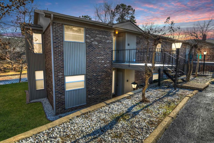 Experience waterfront luxury in this updated 2nd floor condominium at Westport Bay on Lake Hamilton. Conveniently located in the "70 West" area, this immaculate unit is just minutes from shopping, dining, and Hot Springs' attractions. Highlights include new flooring, fresh paint, and a complete kitchen remodel in 2019. The primary bath boasts a beautiful walk-in shower, while the guest bath features a new vanity/sink. Enjoy double walk-in closets in the primary bedroom, a covered balcony, and a stationary covered boat slip (available for an additional price). The gated community offers security, with new gates in 2023, along with picnic areas, a grilling station/firepit, and a swim dock. HOA fees are only $225/month plus $100/month for a "property improvement fund." A covered assigned parking space and extra covered spaces are available, ensuring convenience for residents and guests alike. Don't miss the opportunity to live in this meticulously upgraded waterfront retreat.