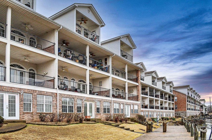 This spacious 3 bedroom/3 bath gated lakefront condo with a one car garage is convenient to all that Hot Springs has to offer! When you enter, you are greeted with high ceilings with crown molding, granite countertops, a large wall of windows overlooking the lake, tile floors in main living areas & private patios on two levels. Two bedrooms and two baths on main level with one being a lakeside suite. Upstairs is one full story of master suite with large sitting area, huge closet, en suite bath, and another private lakeside patio.  This complex is gated, has pool and hot tub, a large green area to walk your dogs and is located close to Hot Springs marina. No nightly rentals allowed.