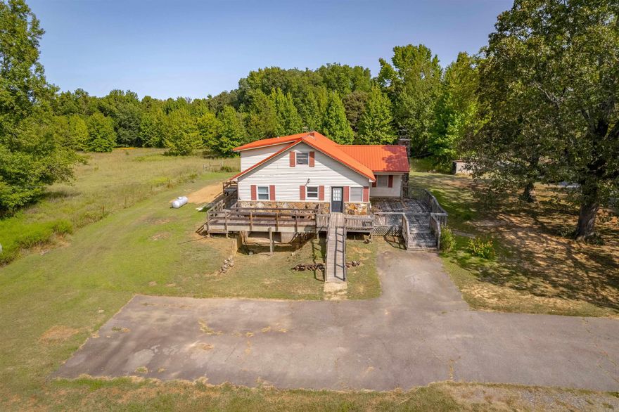 Looking for a nice country setting with plenty of room? This home move in ready with a few small things to fix up. The home has 4 bedrooms and 2 bathrooms and a Basement with a storm shelter. There is plenty of room to build a shop. Must See. Agents see Agent remarks.