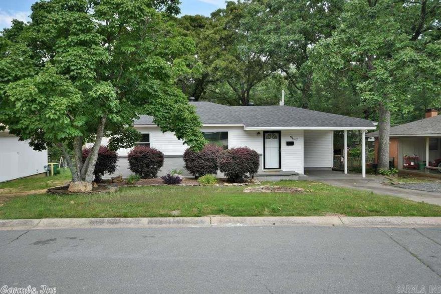 Welcome to this charming 3-bedroom, 1.5-bathroom home in North Little Rock, Arkansas. Located in a quiet, established neighborhood.  Key Features:   3 Bedrooms and 1.5 Bathrooms Beautiful hardwood floors throughout   New windows installed in 2019   AC unit replaced in 2018   Alarm system in place, transferable to buyer   Detached garage/shop in the backyard, perfect for projects, storage, or a workshop   Huge Fully fenced backyard for added privacy and security   8x10 storage shed for additional storage needs   Double wide gate on one side of a double-sided driveway, offering extra convenience and access to the backyard
