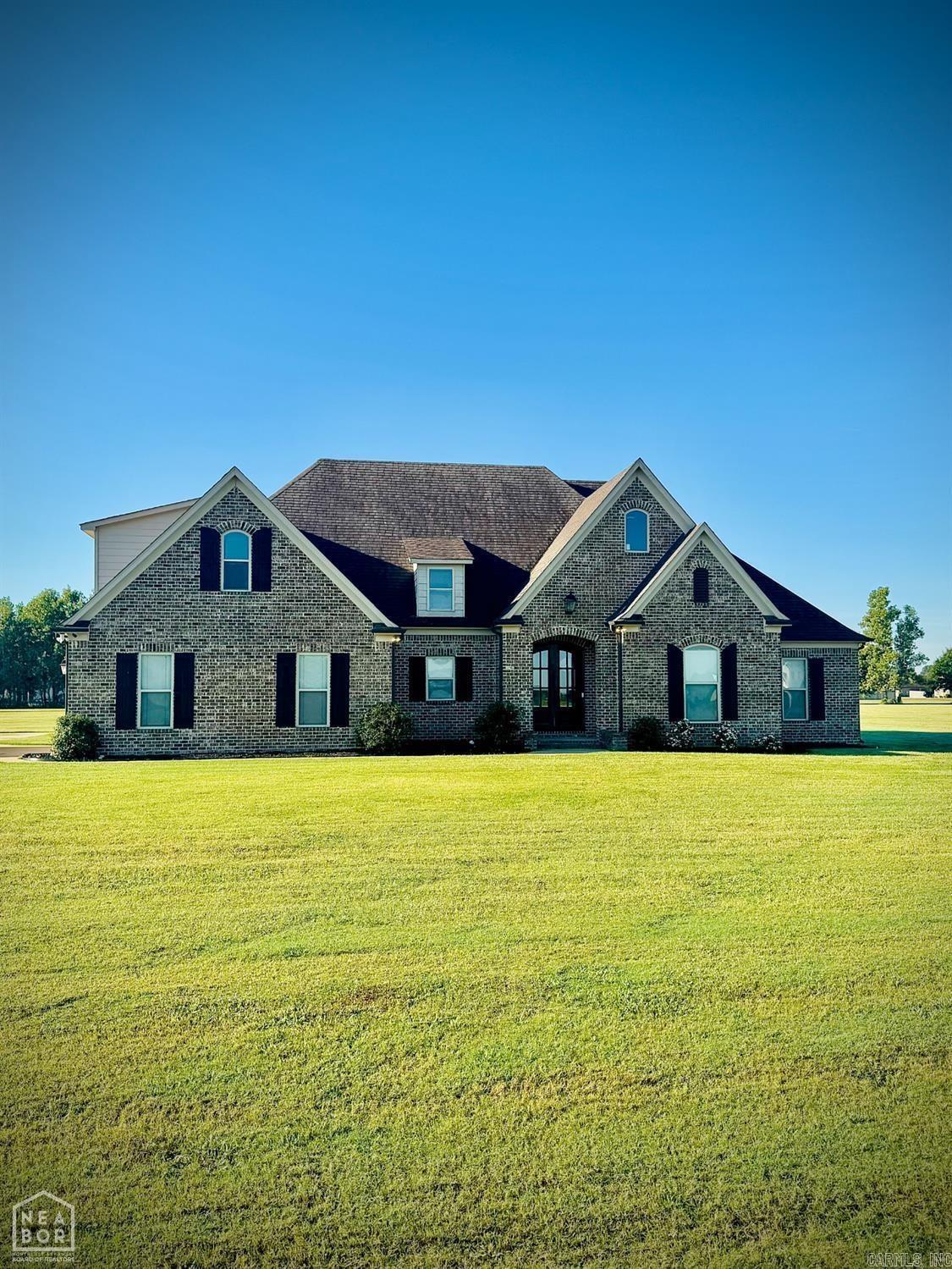 Welcome to your dream home! Nestled on 1.7 peaceful acres, this beautifully maintained 4-bedroom, 2.5-bath residence offers the perfect blend of comfort, style, and functionality. Step inside to find tile floors throughout for a sleek, cohesive look and easy maintenance. The custom kitchen cabinets and granite countertops throughout the home provide a touch of elegance and durability, while the large walk-in pantry offers ample storage for all your culinary needs. The open-concept layout flows effortlessly into the living and dining areas, all enhanced by beautiful lighting that adds warmth and charm to every room. Retreat to the spacious primary bedroom featuring a luxurious en-suite bath with dual vanities and premium finishes. Each additional bedroom is generously sized and well-appointed for family or guests. You will love the exceptional size laundry room, perfect for added organization and convenience. Step outside to enjoy your morning coffee or evening unwind in the screened-in back porch, offering serene views of your expansive property. This home combines high-quality finishes with a smart, livable layout. You do not want to miss your chance to own this stunning property!