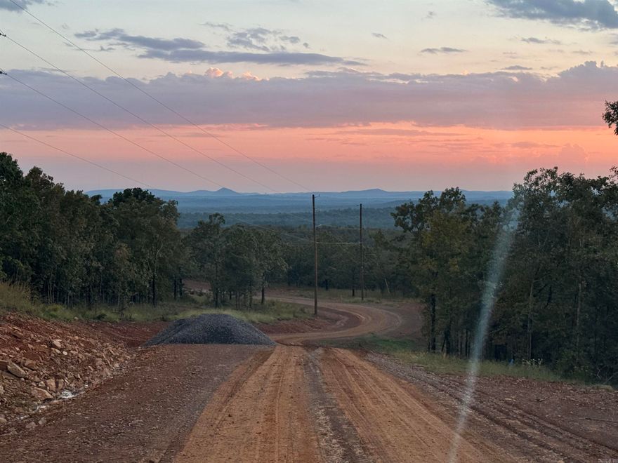 Welcome to Seven Lakes Ranch, a premier gated acreage community in Conway offering space, privacy, and beautiful views of Lake Conway and Pinnacle Mountain. Enjoy paved roads, all utilities, and natural surroundings including lakes, rolling terrain, and abundant wildlife. Located just 10 minutes from I-40 Mayflower, approximately 15 minutes from downtown Conway, 25 minutes to West Little Rock, and 25 minutes to Cabot, this community offers the perfect balance of convenience and peaceful country living. Seven Lakes Ranch is thoughtfully designed for those seeking luxury, land, and long-term value. Bring your builder and create the home you’ve been dreaming of. Gravel roads throughout will be paved by summer 2026.