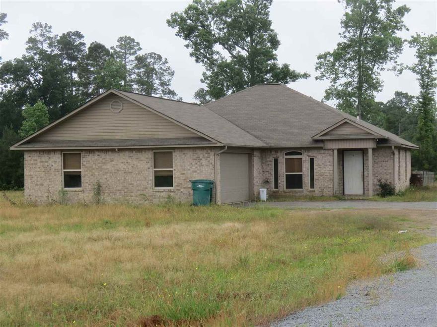 Great home on 3 acres in the Watson Chapel School District.    This custom built home has an open kitchen/living area.  Split floor plan, large master bathroom and large walk in closet.  Double garage.  Covered back patio.  Taxes are after Homestead Credit.  Call today for your personal tour.  Agents See Remarks.