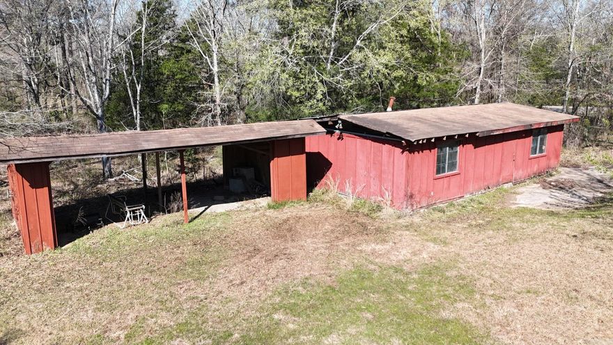 7-site RV park located just minutes from Gillham Lake and the Cossatot Reefs Campground in southwest Arkansas, offering an income-producing opportunity for an owner-operator or investor. Each RV site has full hookups with power, septic, and water (according to seller) suitable for nightly, weekly, or longer-term guests seeking access to area boating, fishing, and camping on Gillham Lake and nearby Cossatot River recreation. On-site improvements include a shop building (square footage per MLS) that can be used for maintenance, storage, or potential future expansion, plus a separate laundry room of approximately 192 square feet. The property totals about 7.65 unrestricted acres (available for $200,000, MLS #26008888) and can be used as a whole or functionally split, with roughly 3.5 acres on the Gillham Lake Road side containing the RV sites and buildings, and an additional 4.15 acres with power already in place across the road. Buyers should verify all acreage, utilities, zoning/land-use permissions, and potential for additional RV spaces, cabins, or storage units according to their development plans.